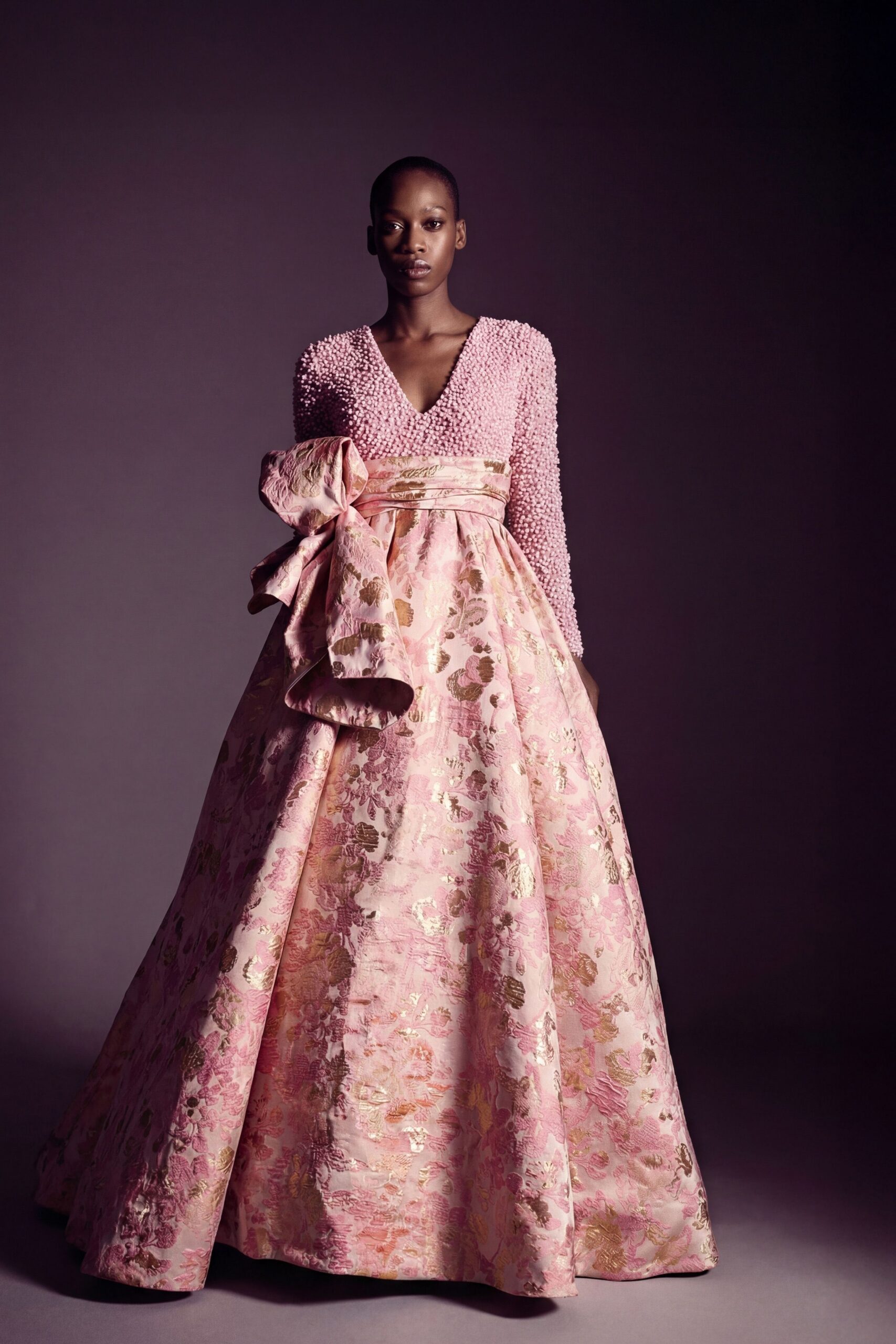 pink embroidered long-sleeve gown