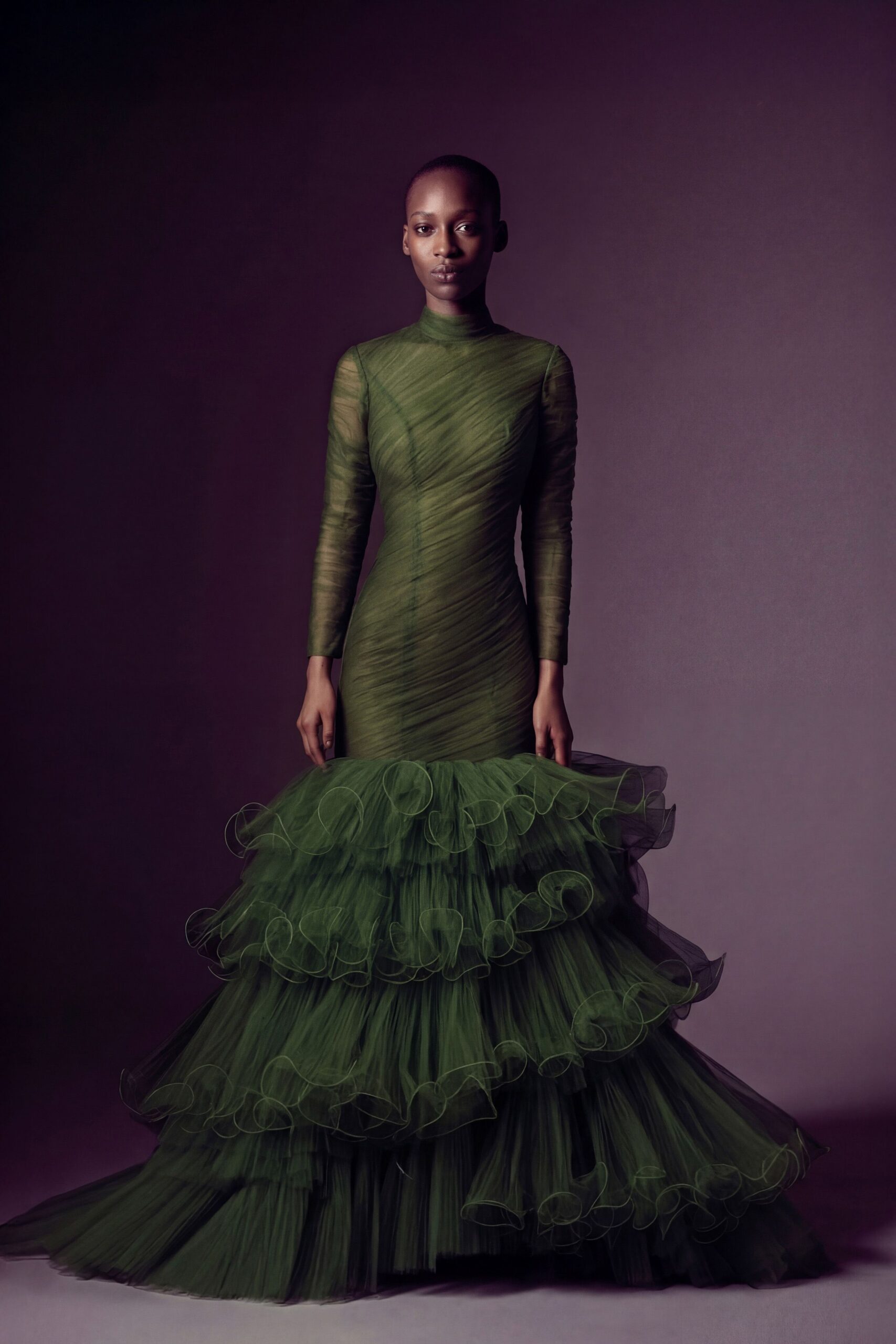 green tulle long-sleeve gown