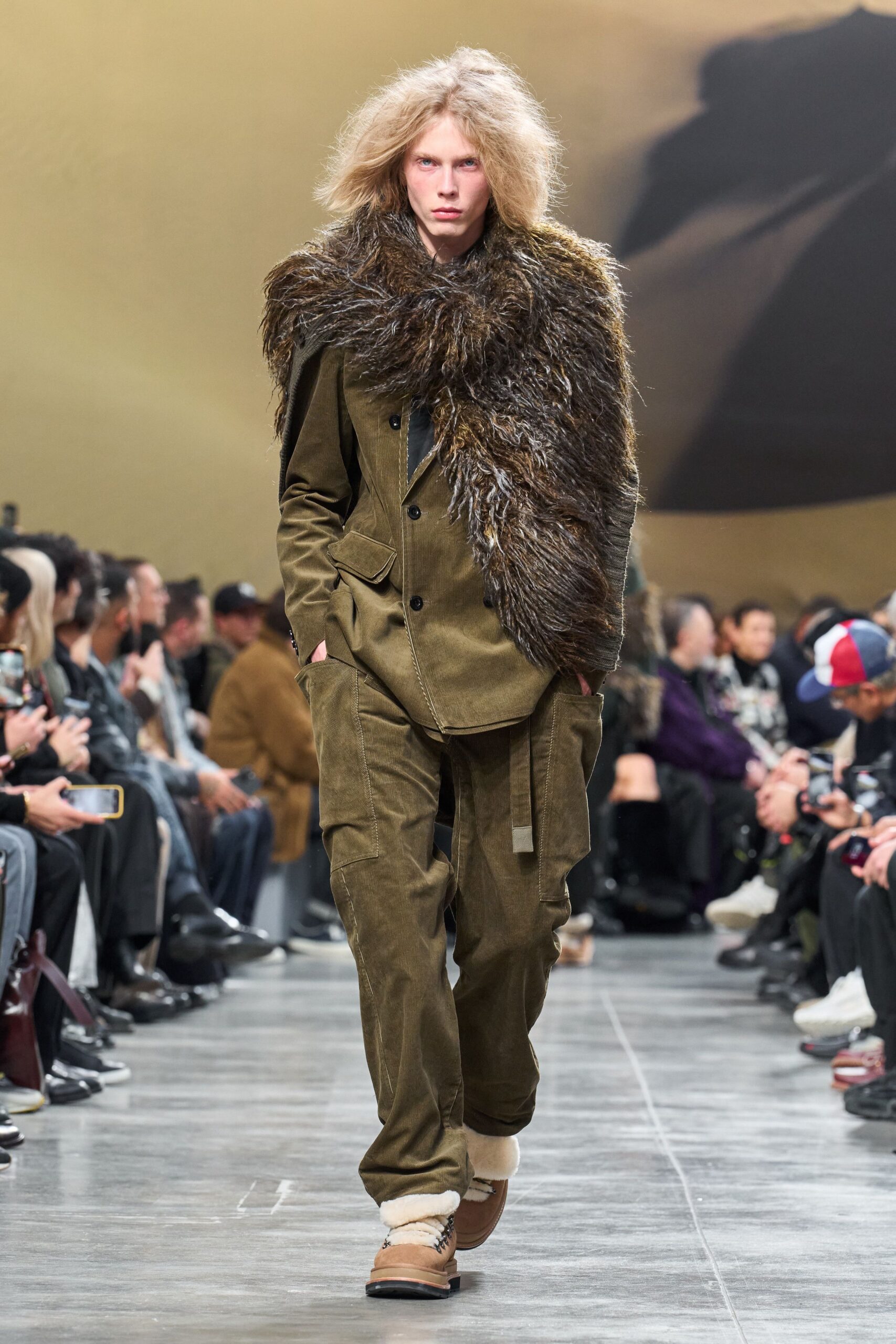olive tailored suit with fur scarf