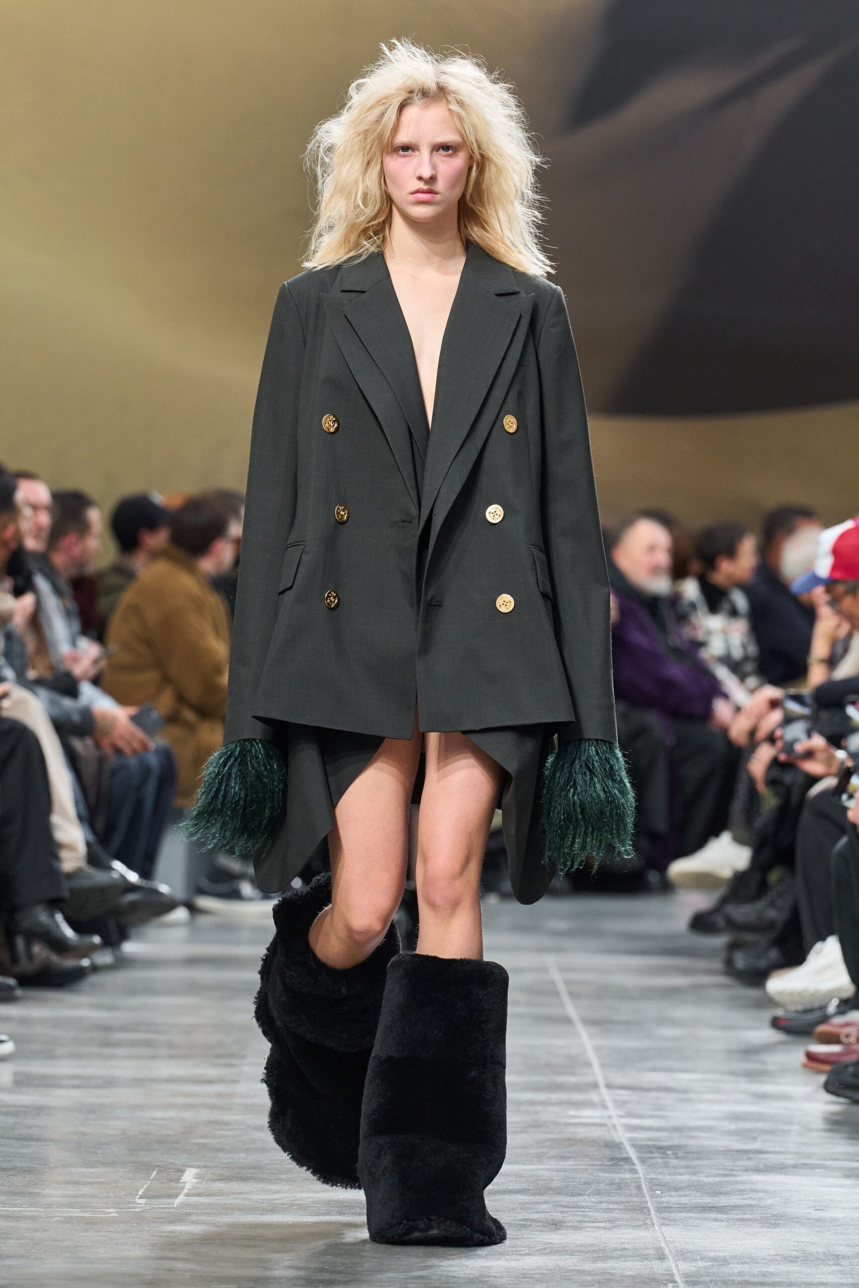 black structured blazer with fur boots