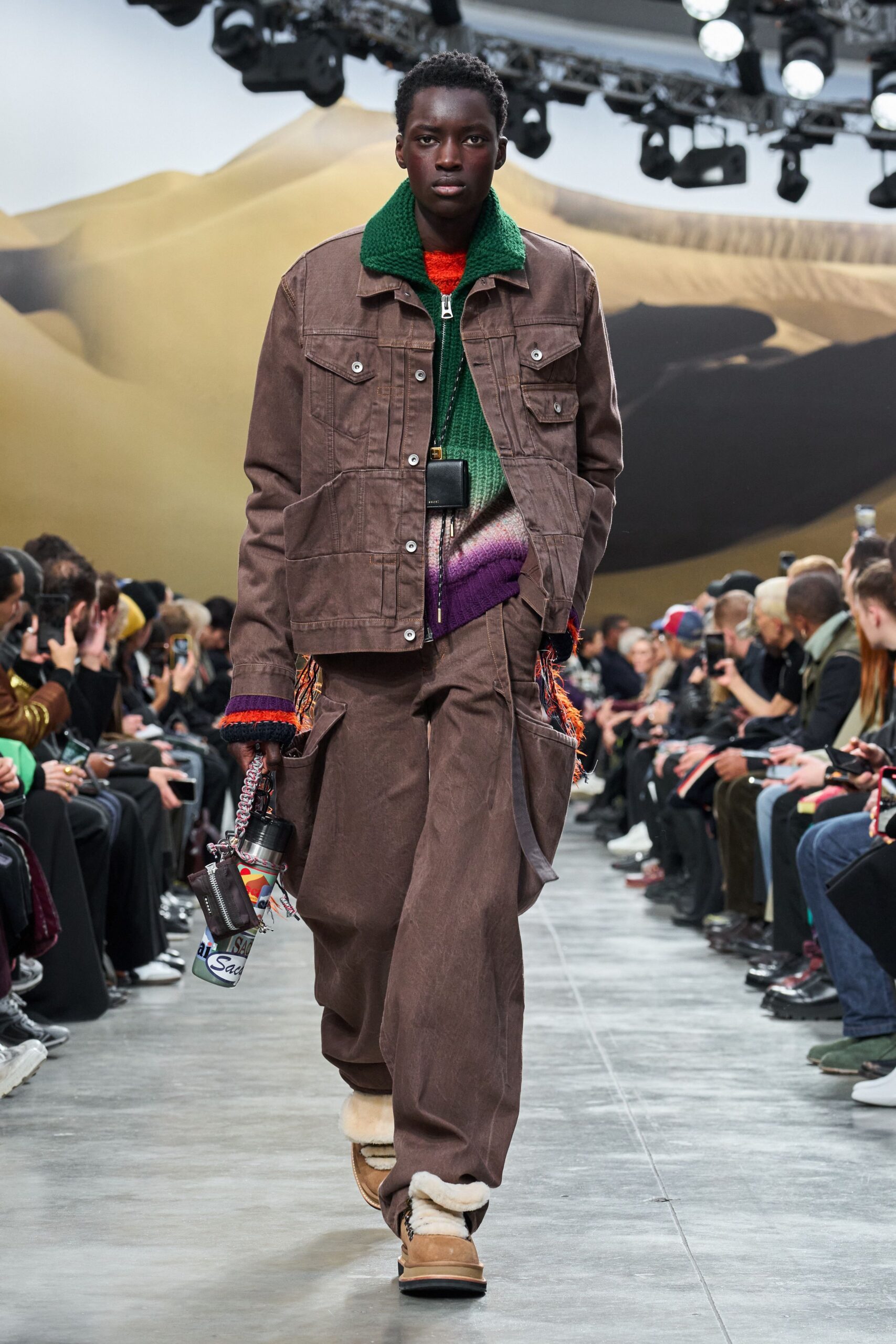 brown denim jacket with green sweater