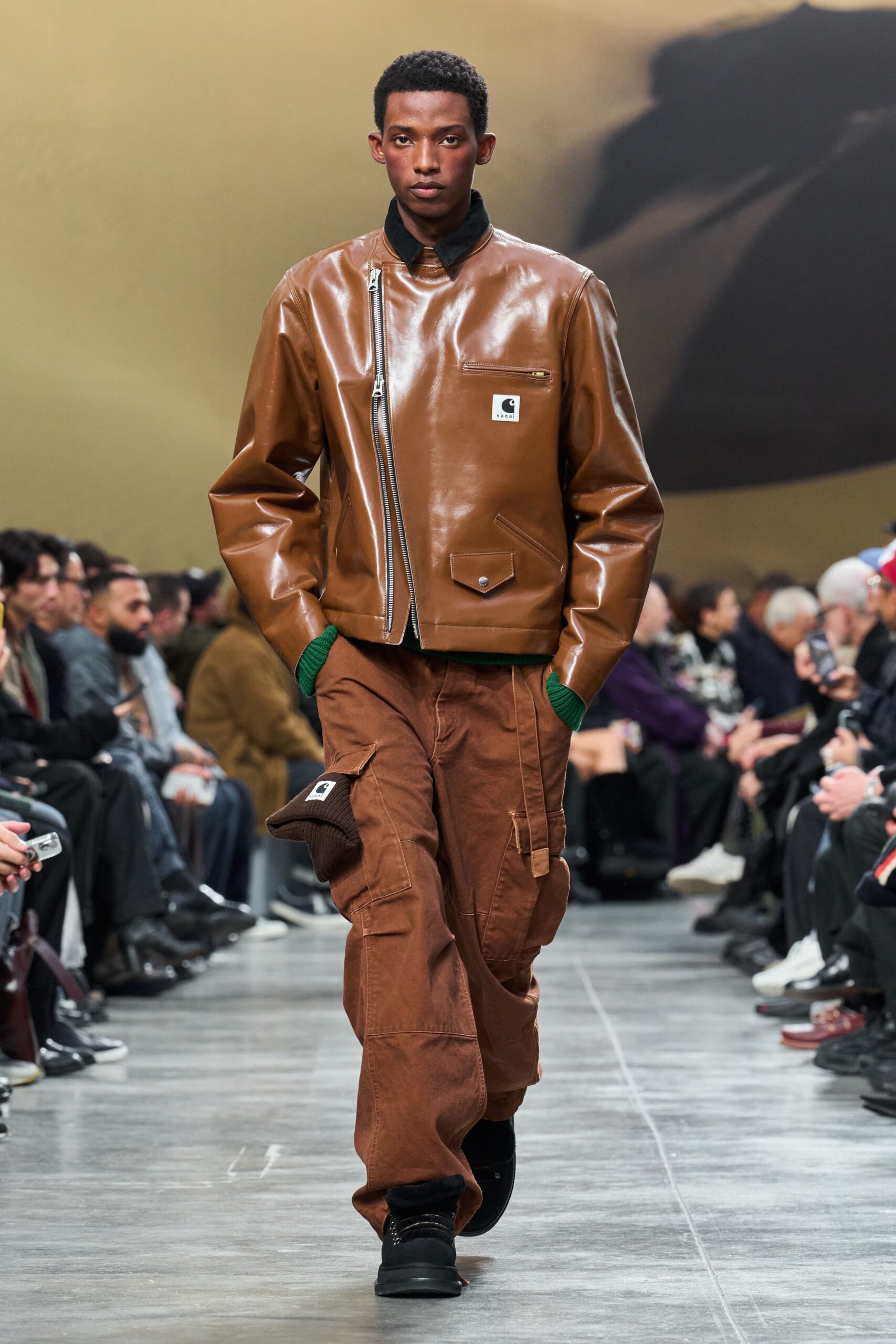 brown vinyl fitted jacket and cargo pants