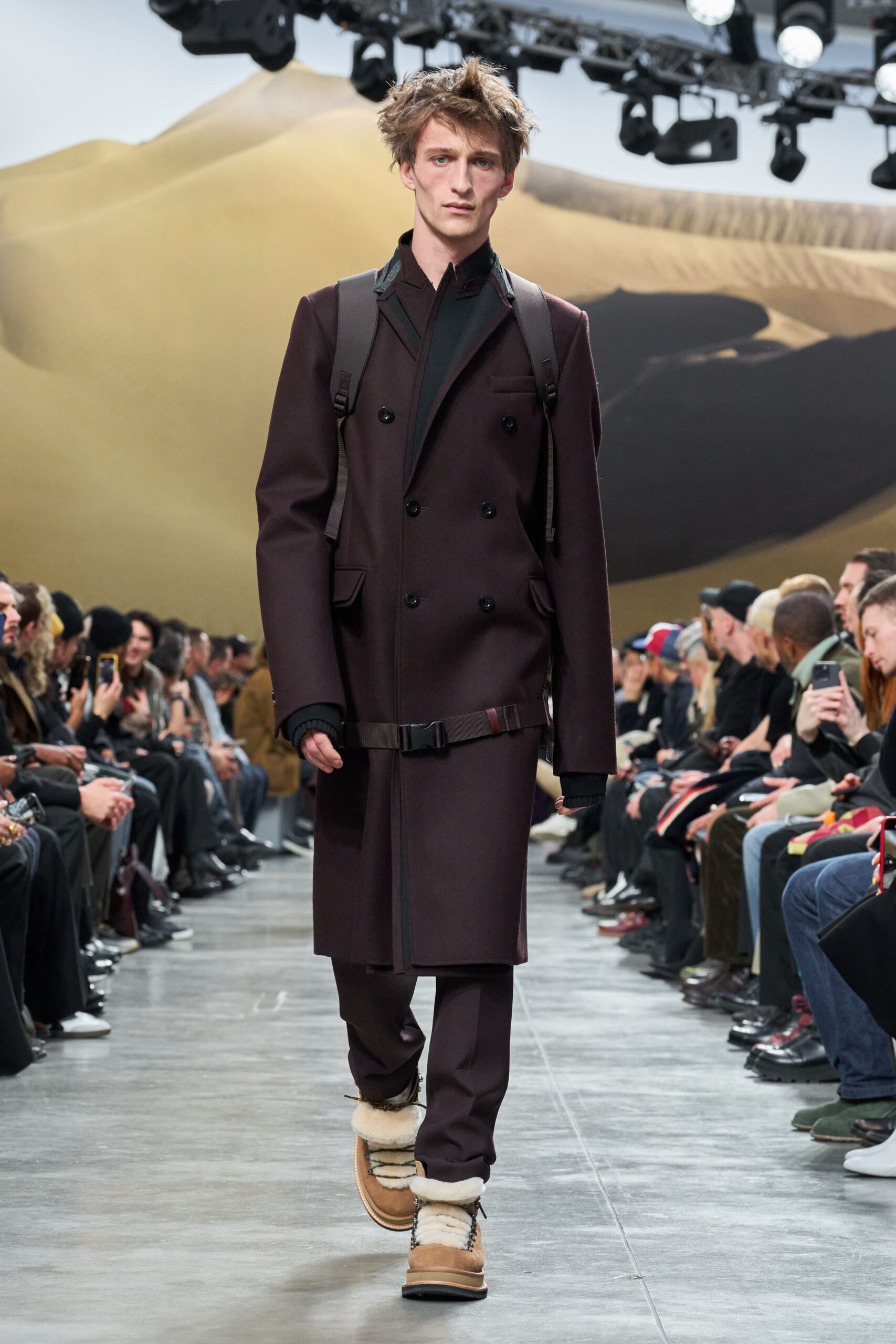 brown wool coat and tailored pants