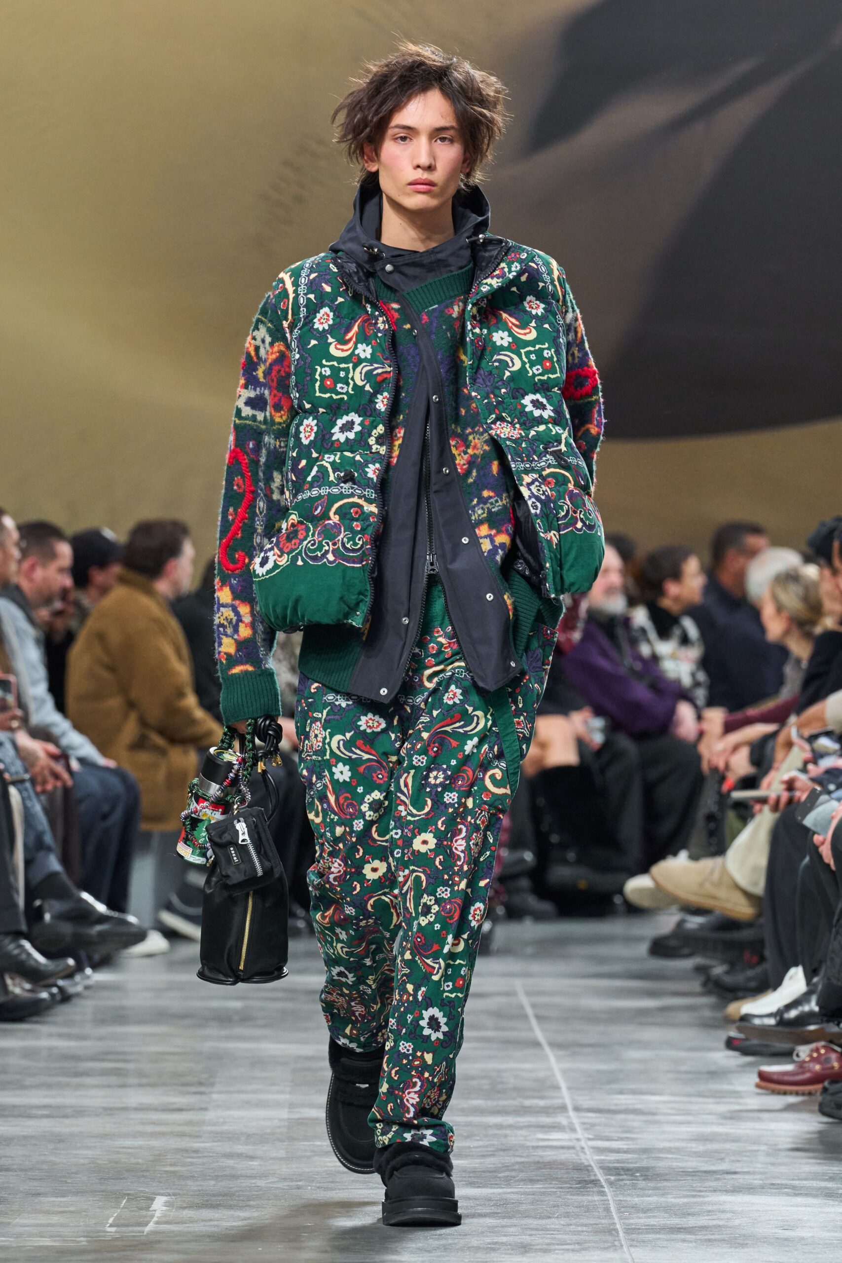 embroidered green jacket with black shirt