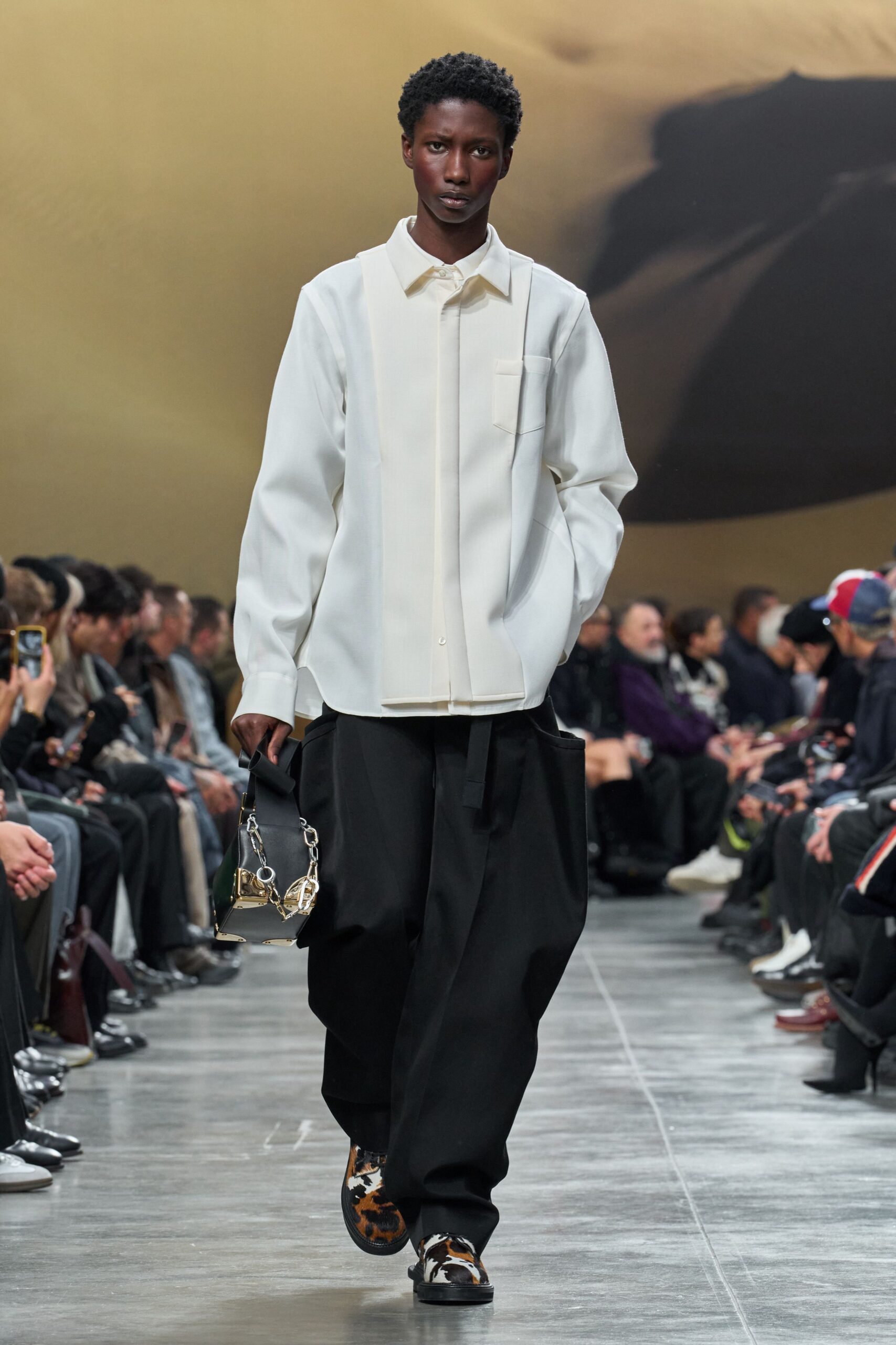 oversized white shirt with relaxed black pants
