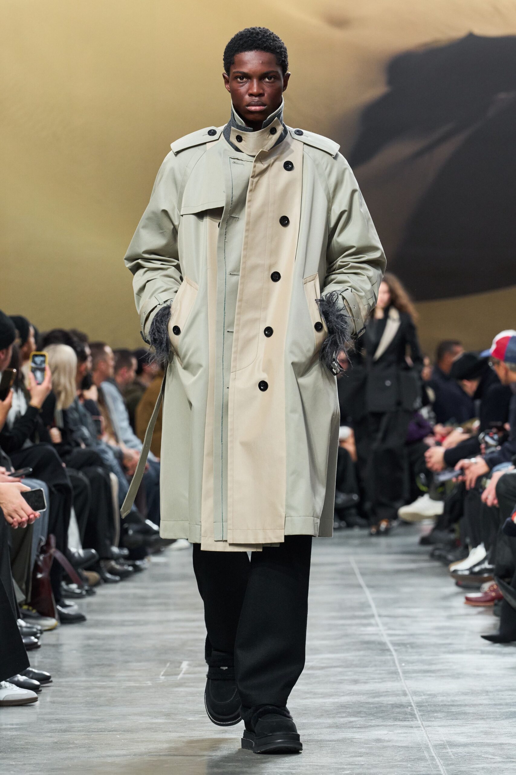 beige trench coat with black pants