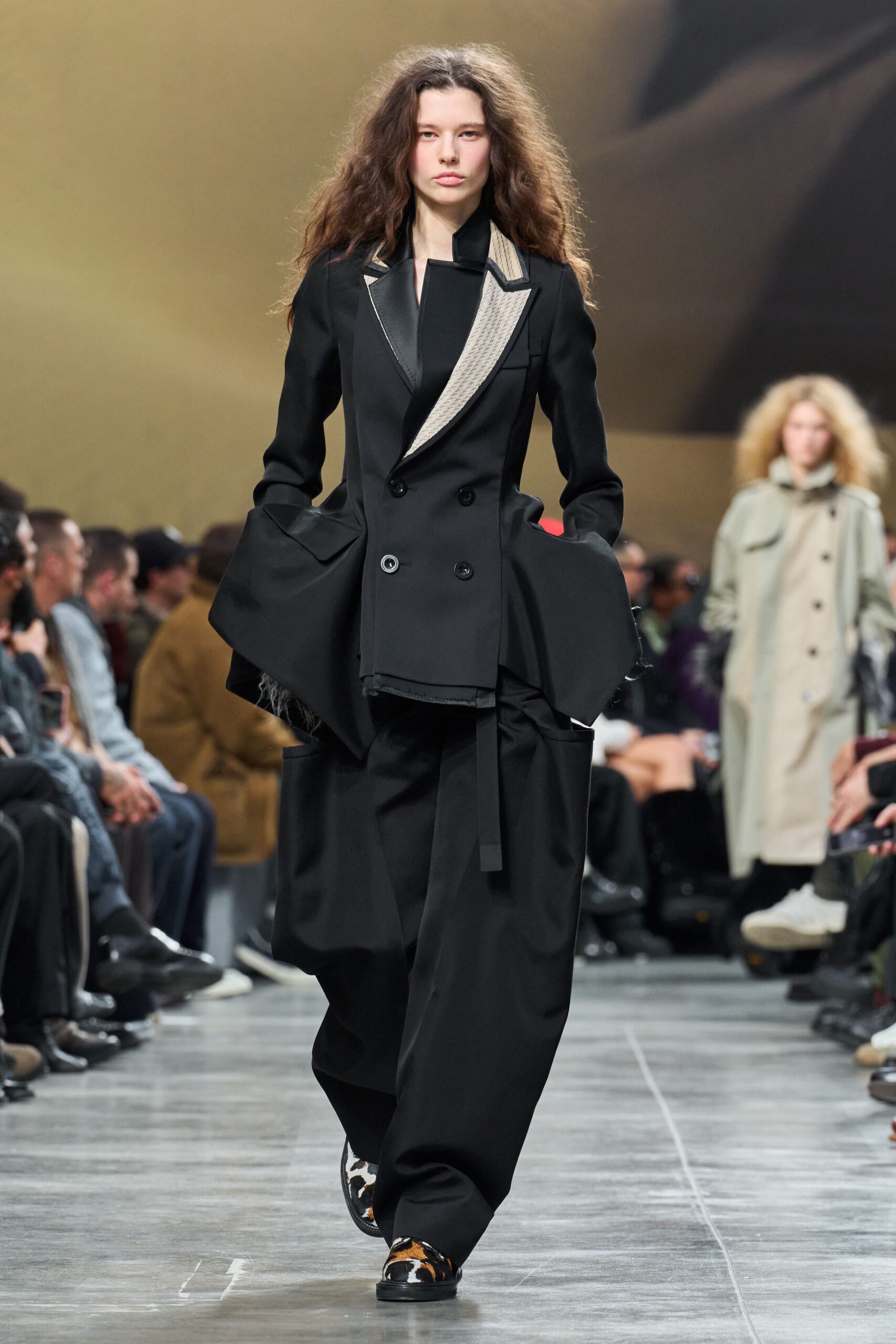 black structured blazer with relaxed pants