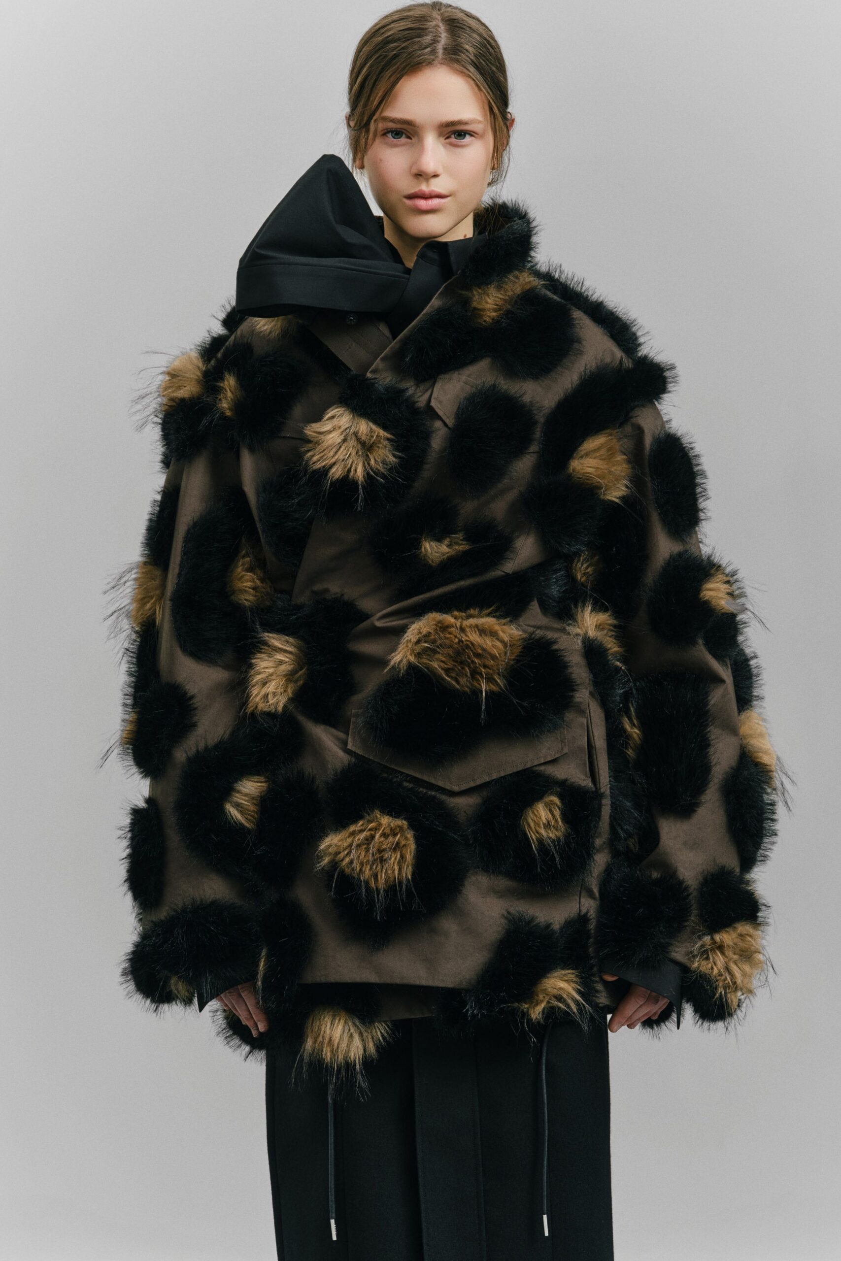 oversized brown faux-fur coat with hood
