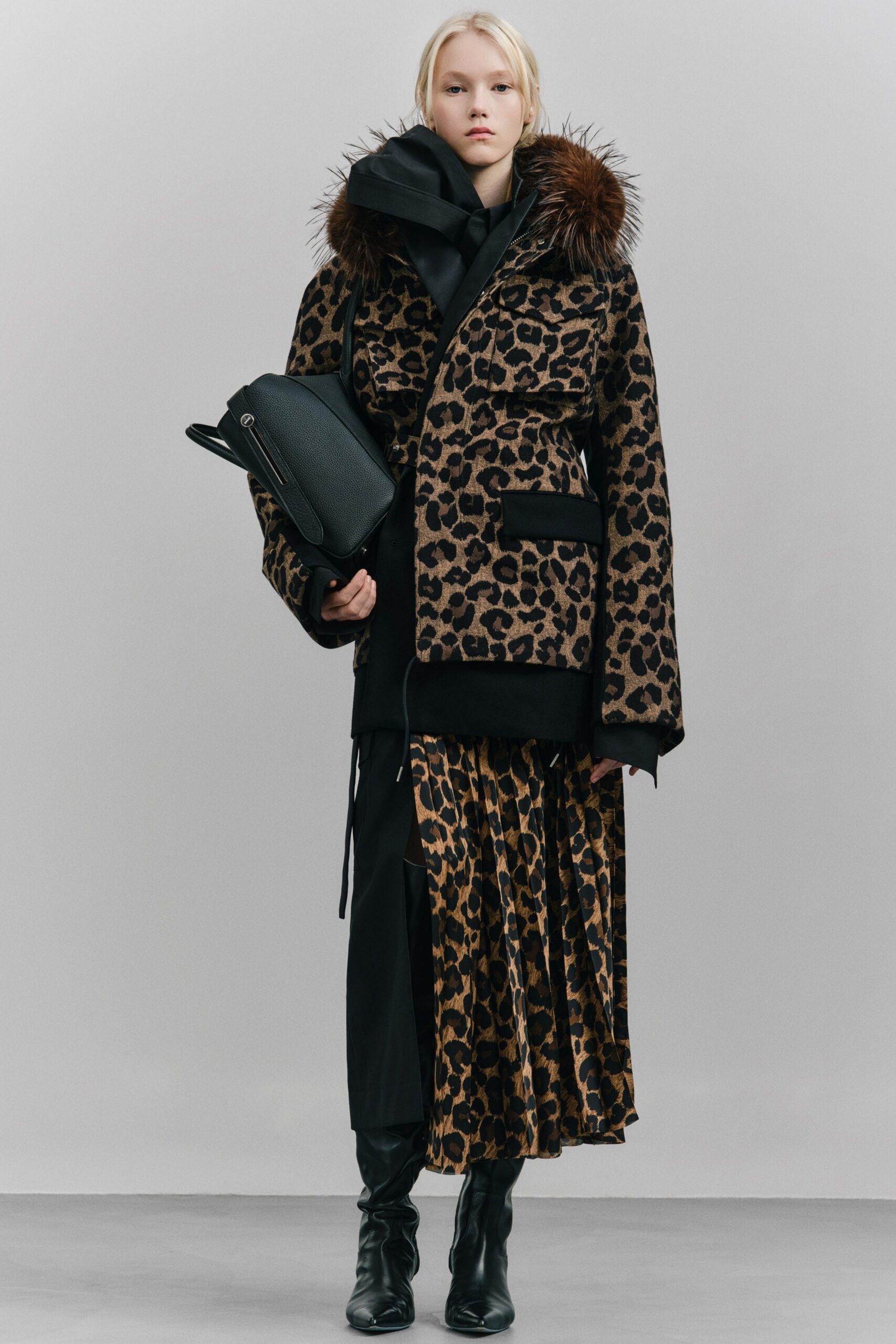 brown animal-print coat and black midi dress
