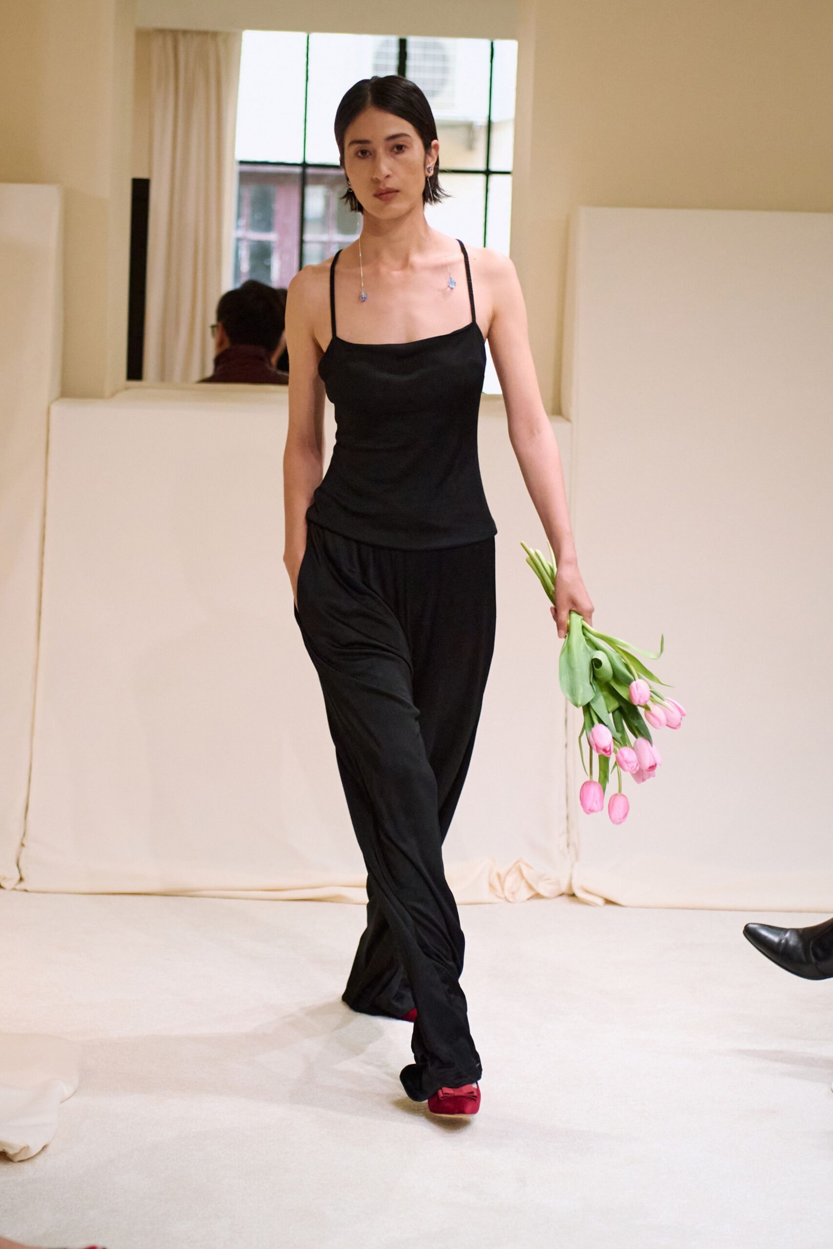 black silk sleeveless v-neck fitted top