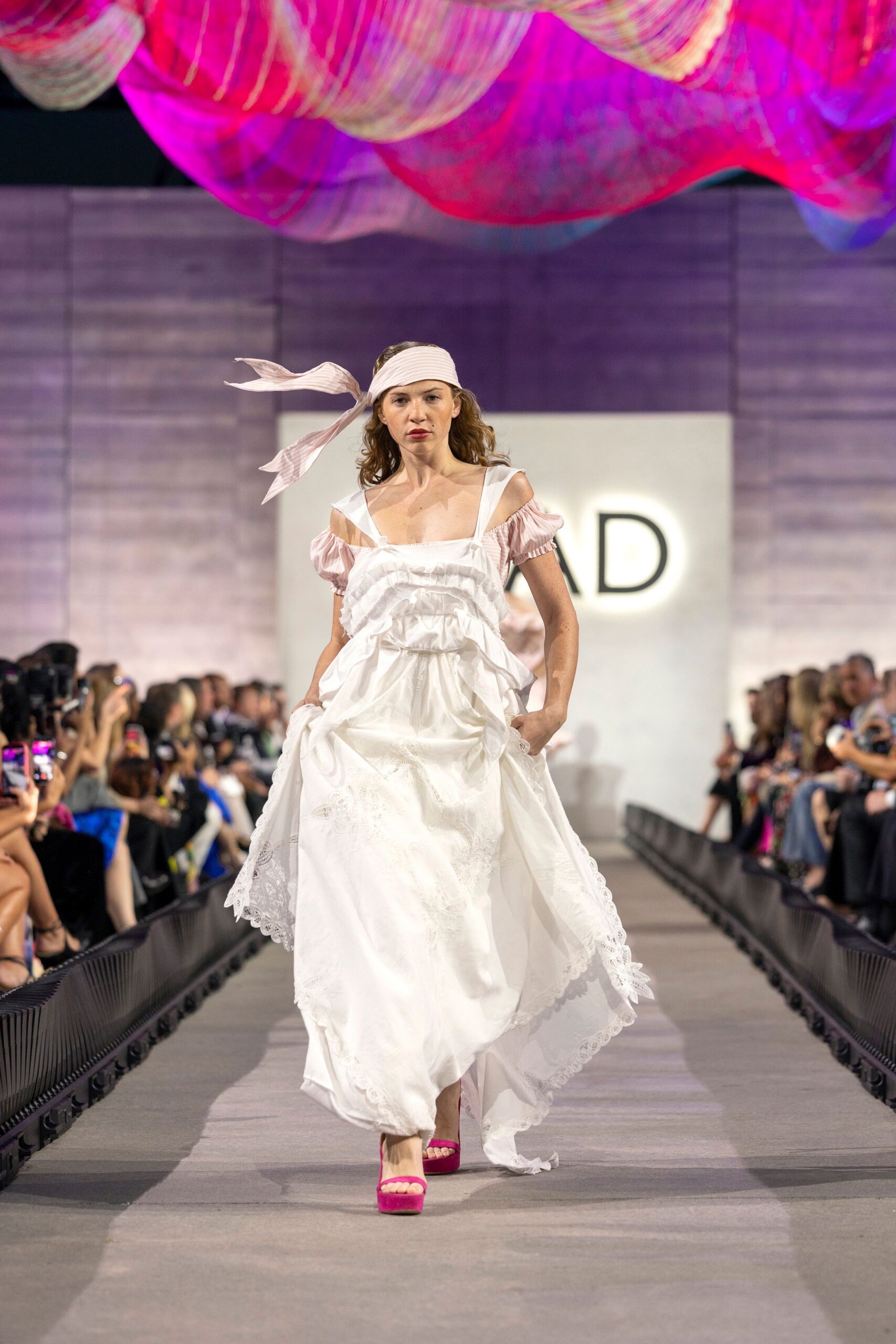 white cotton sleeveless v-neck fitted ruffled embroidered gown