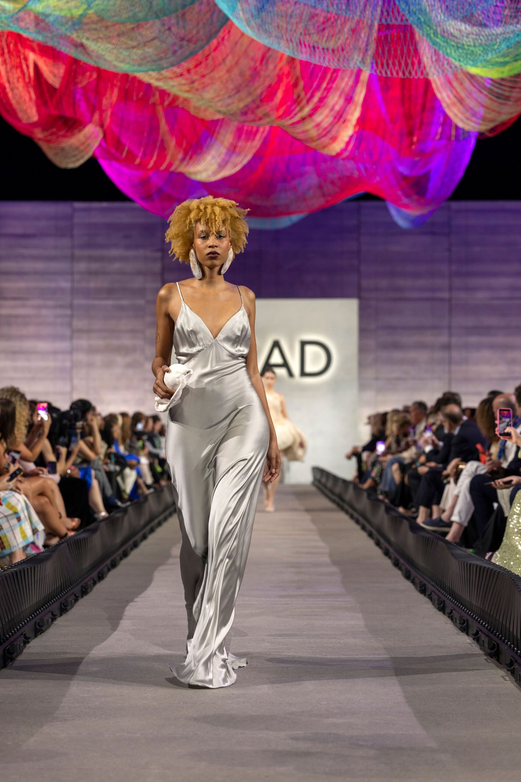 white silk sleeveless gown