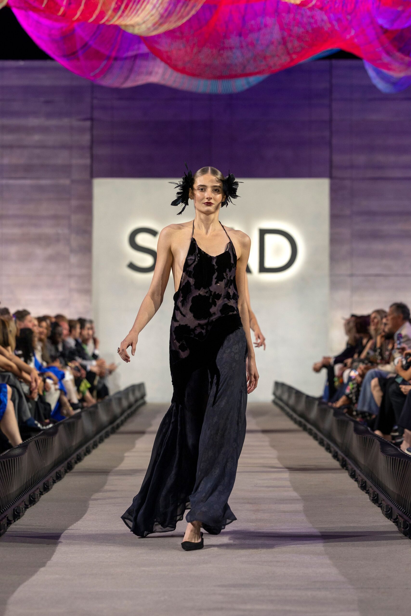 black silk sleeveless v-neck fitted draped flowing gown
