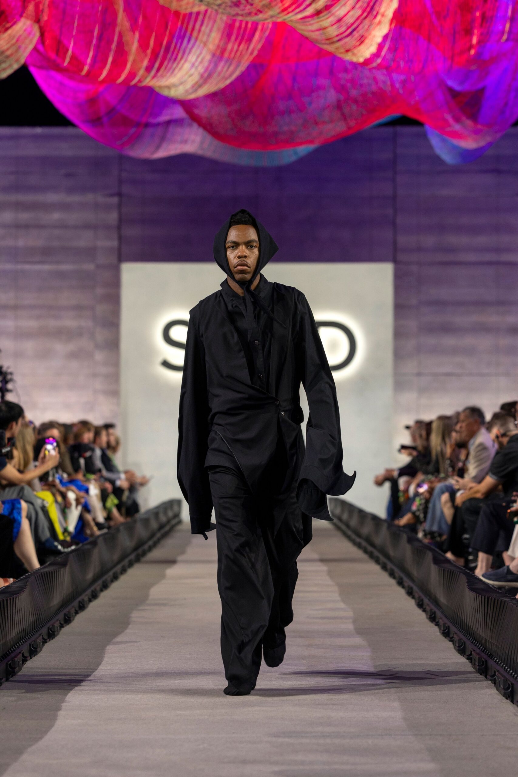 black relaxed coat and pants