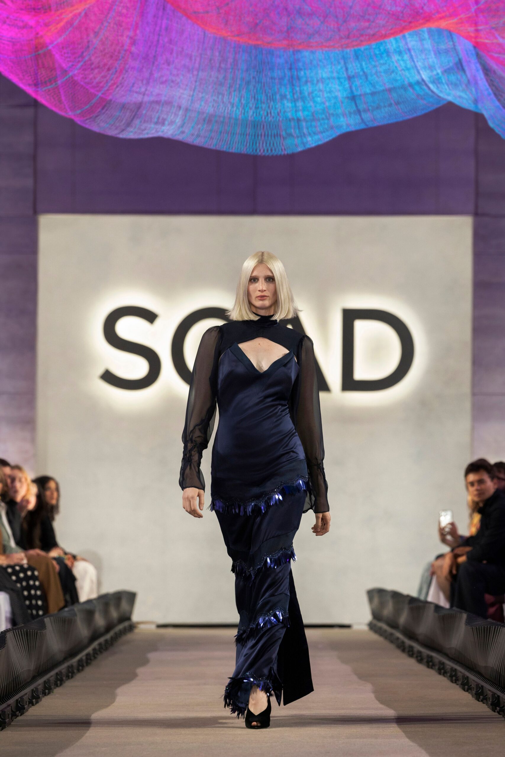 blue silk long-sleeve v-neck fitted fringed draped gown