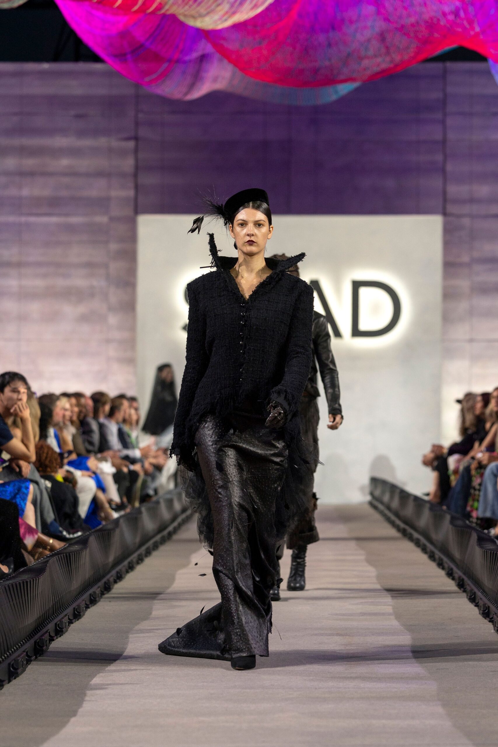 black wool long-sleeve collared fitted buttoned fringed jacket