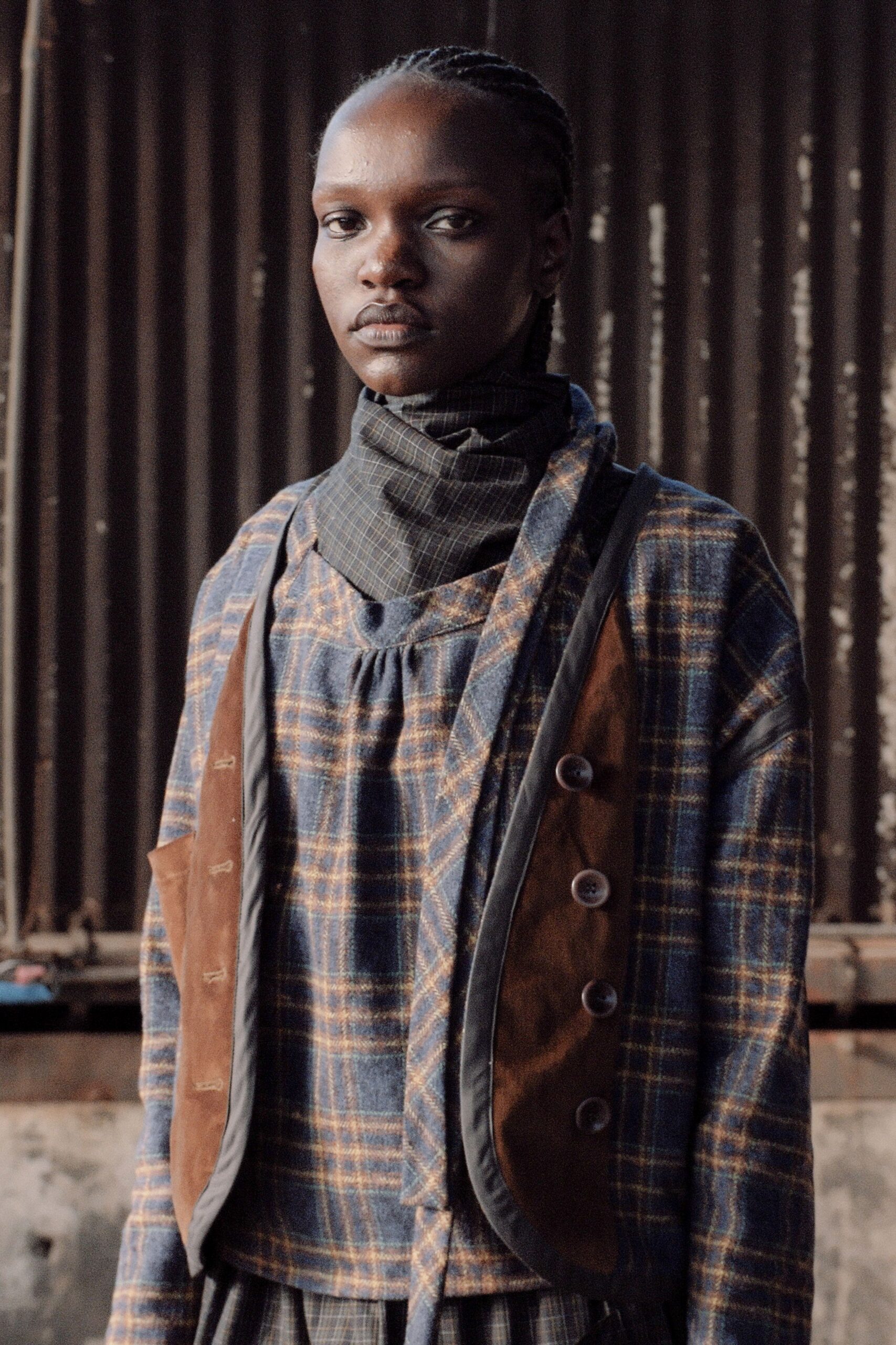brown and blue checked vest and top