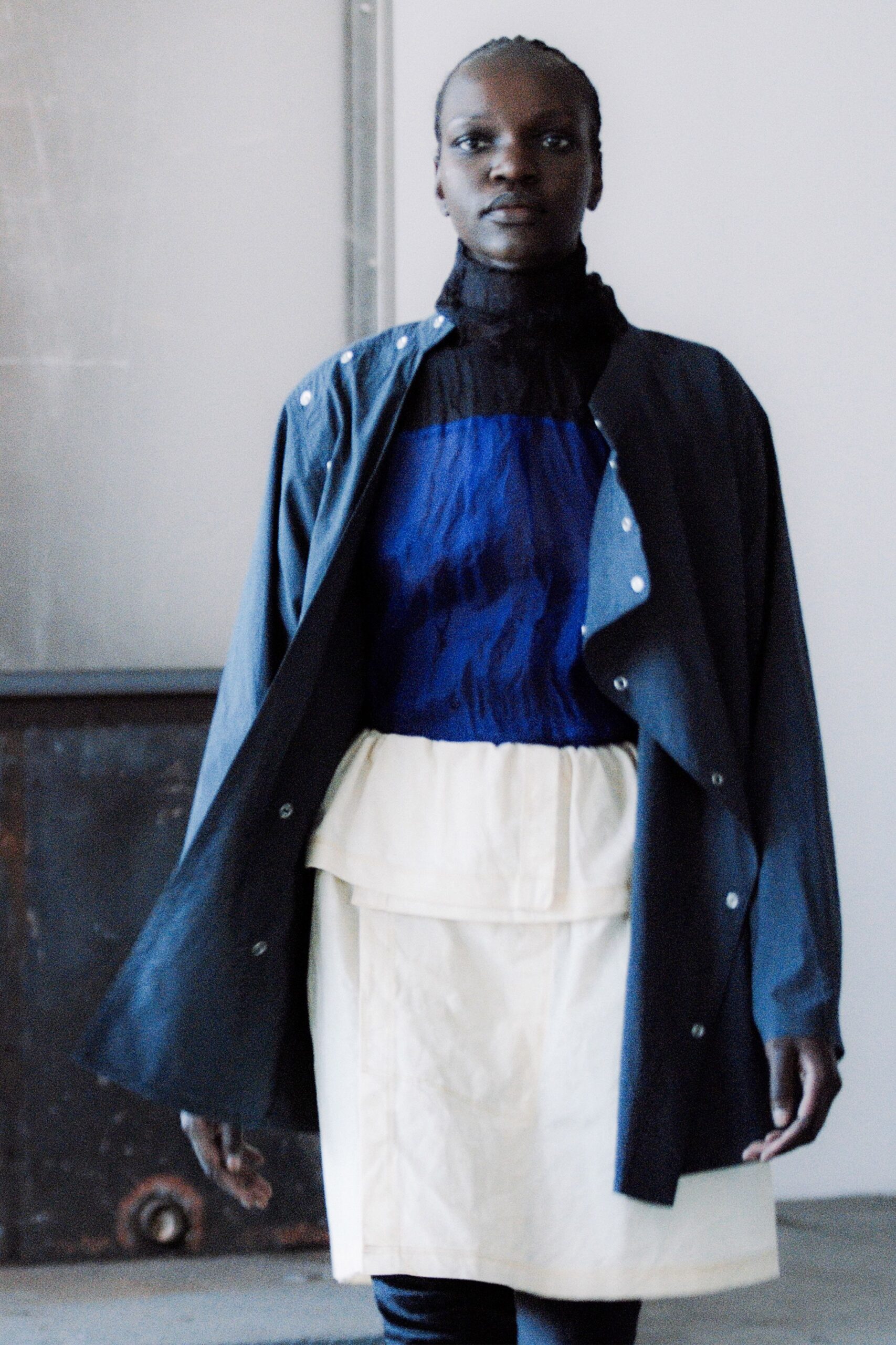 blue cotton jacket with black top