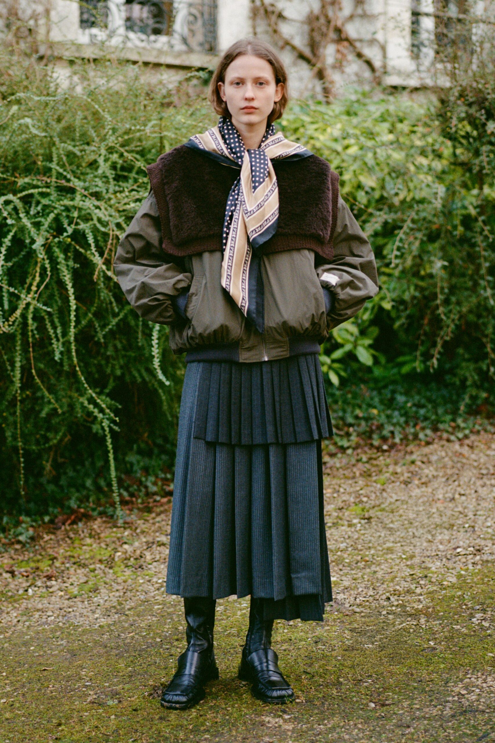 green relaxed jacket with pleated skirt