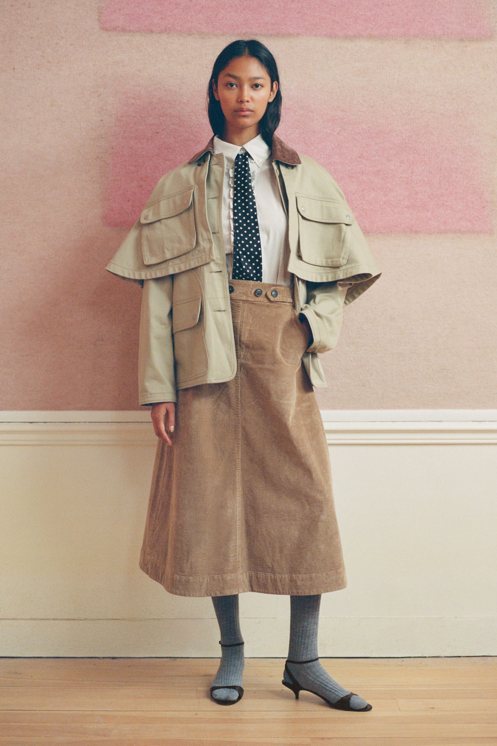 beige jacket white shirt brown skirt