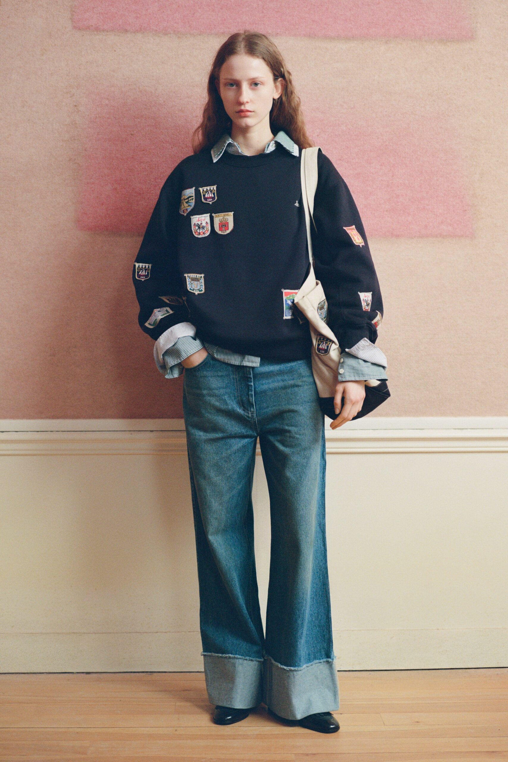black relaxed sweater with blue shirt
