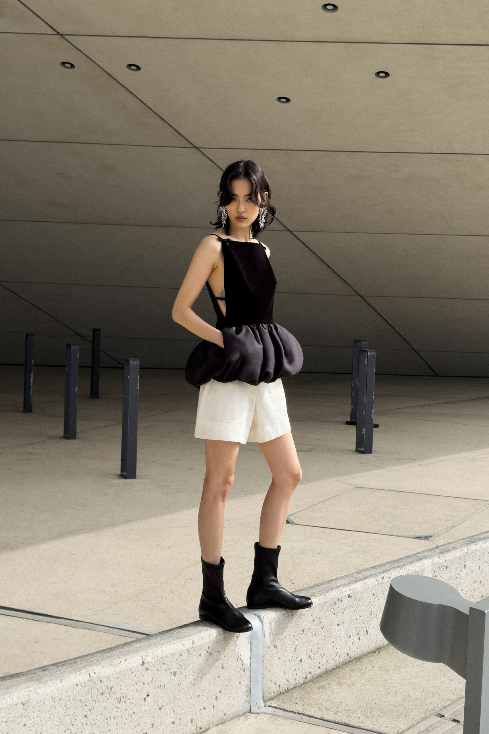 black fitted top white relaxed shorts
