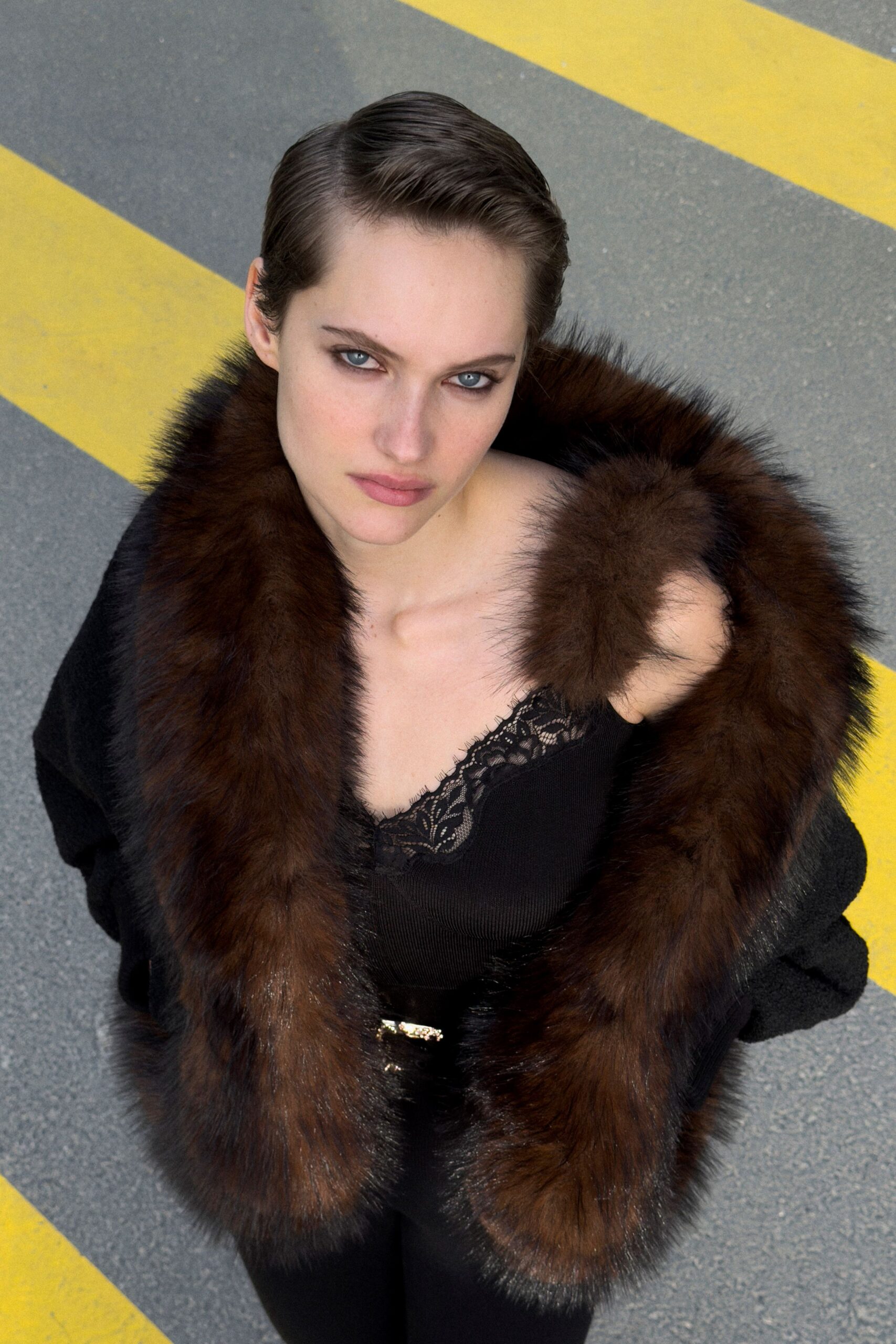 black silk sleeveless top and coat