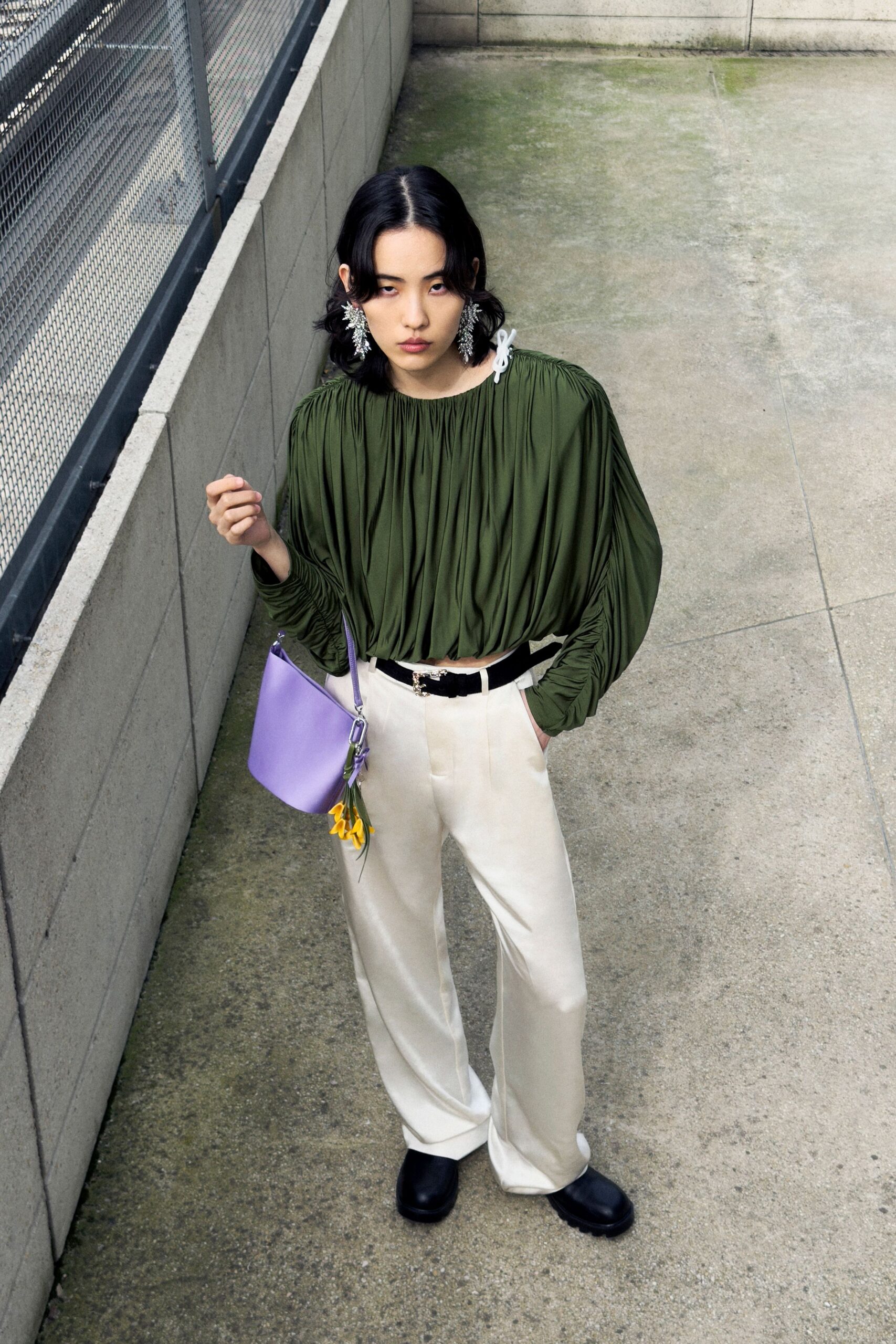 green pleated top beige pants