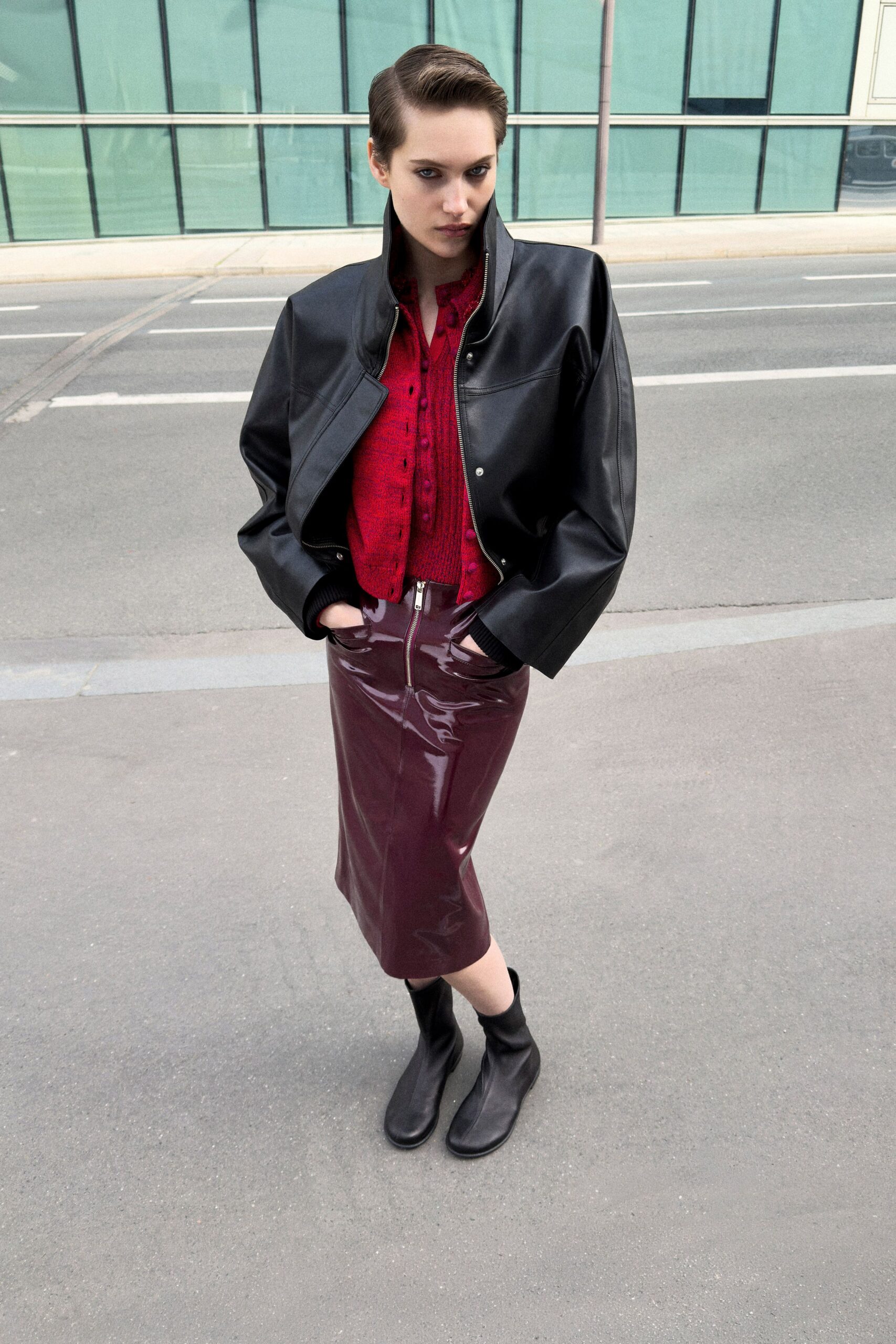 black leather long-sleeve collared oversized jacket