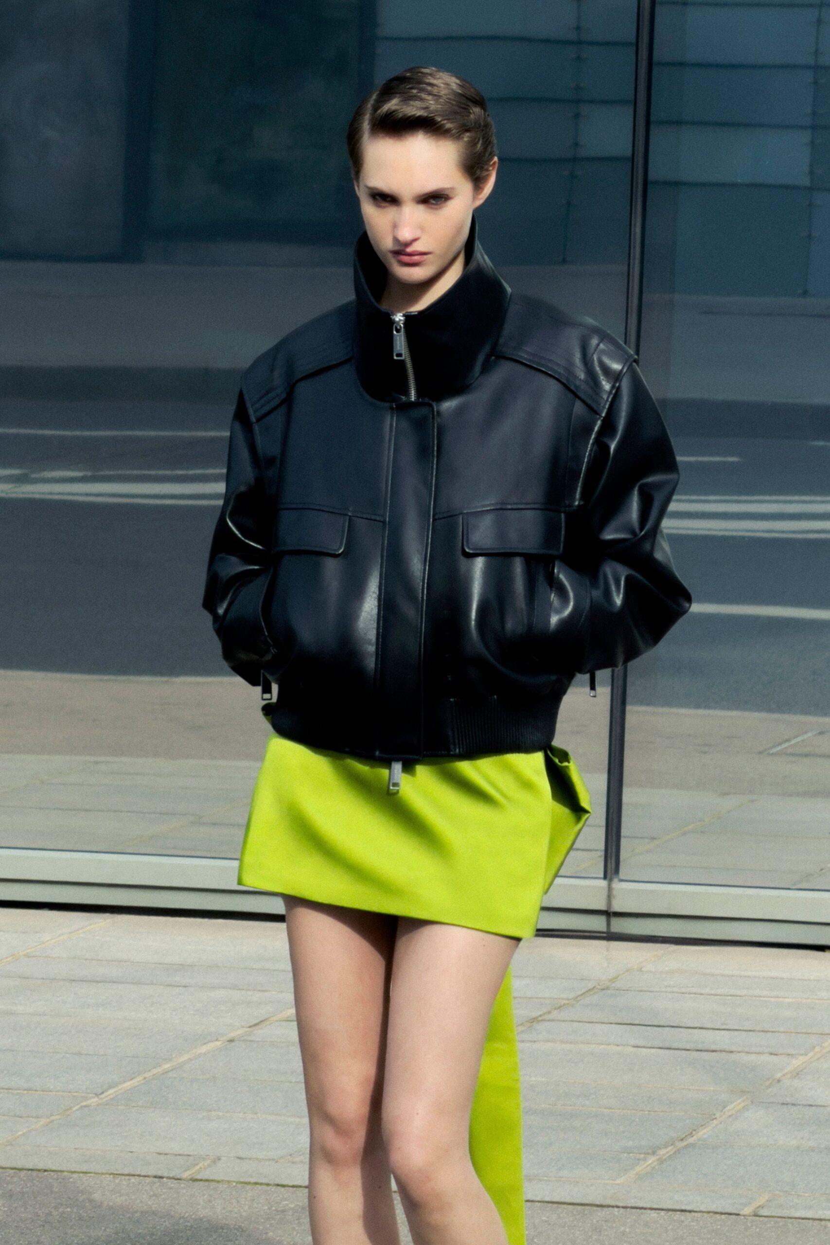 black leather long-sleeve collared oversized zippered jacket