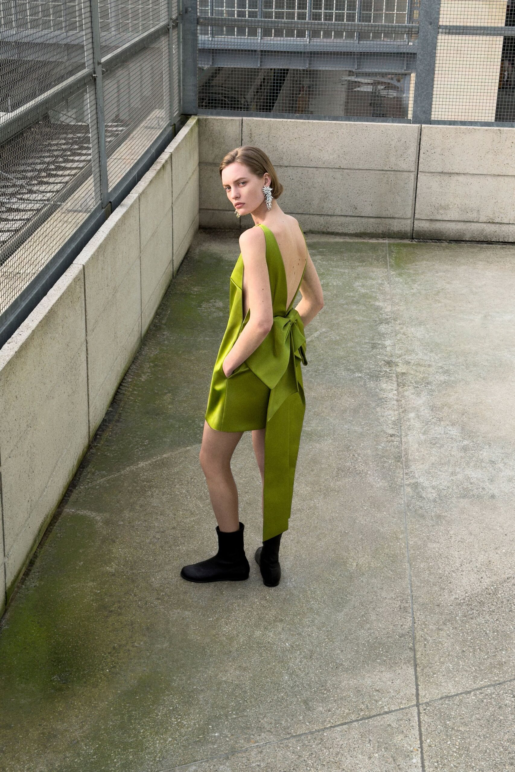 green silk sleeveless backless fitted pockets mini dress