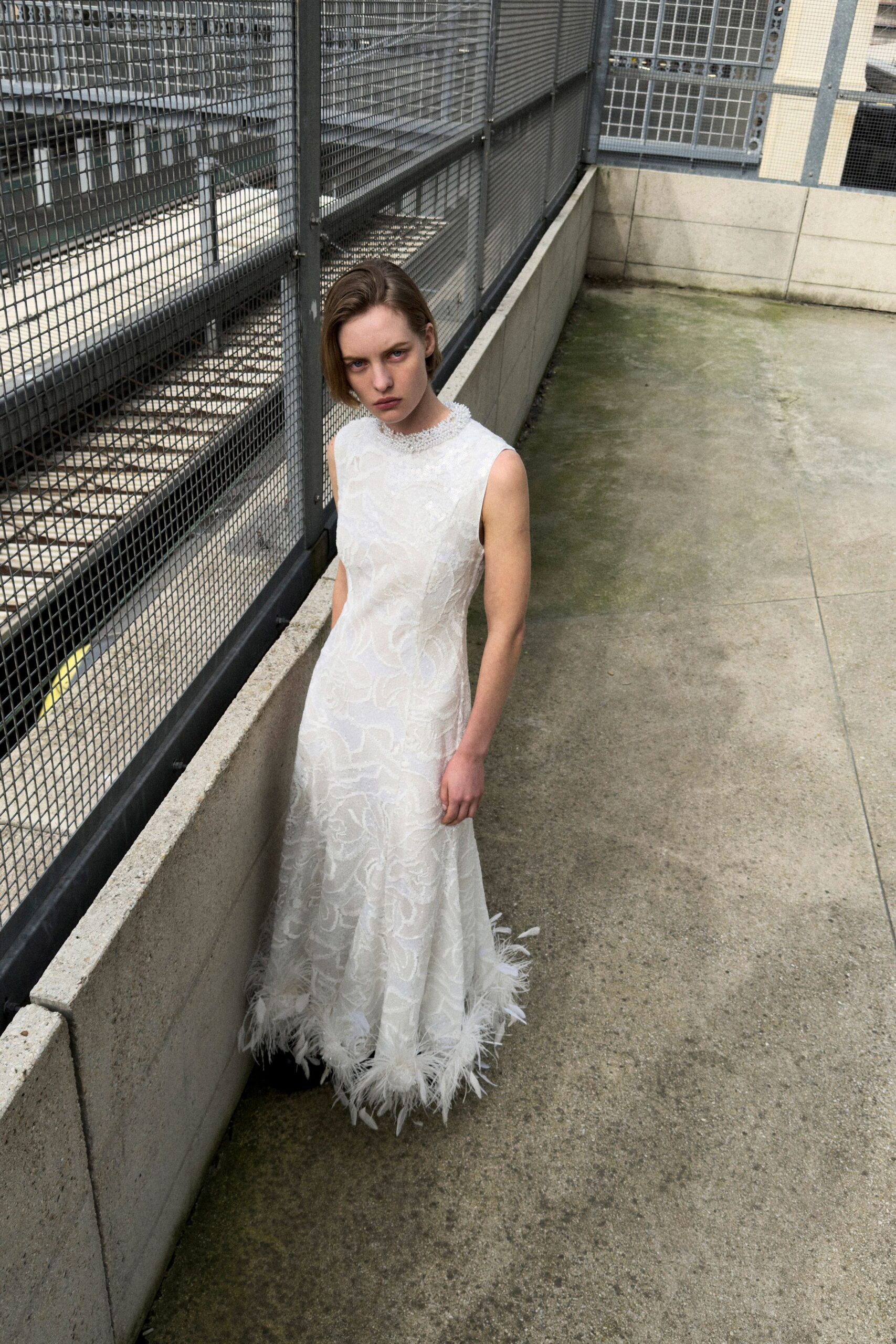 white lace sleeveless gown