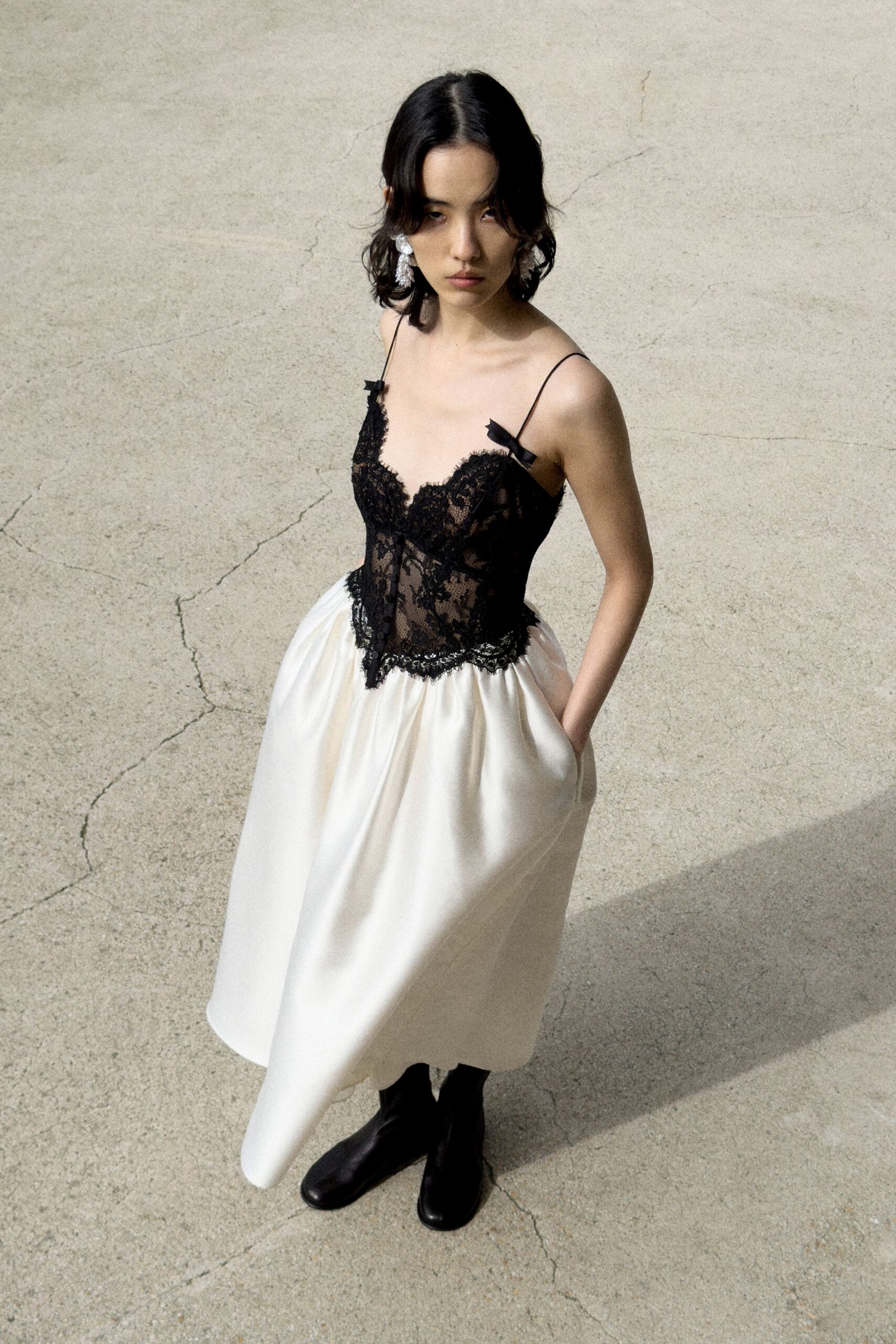black silk sleeveless v-neck fitted pleated embroidered dress