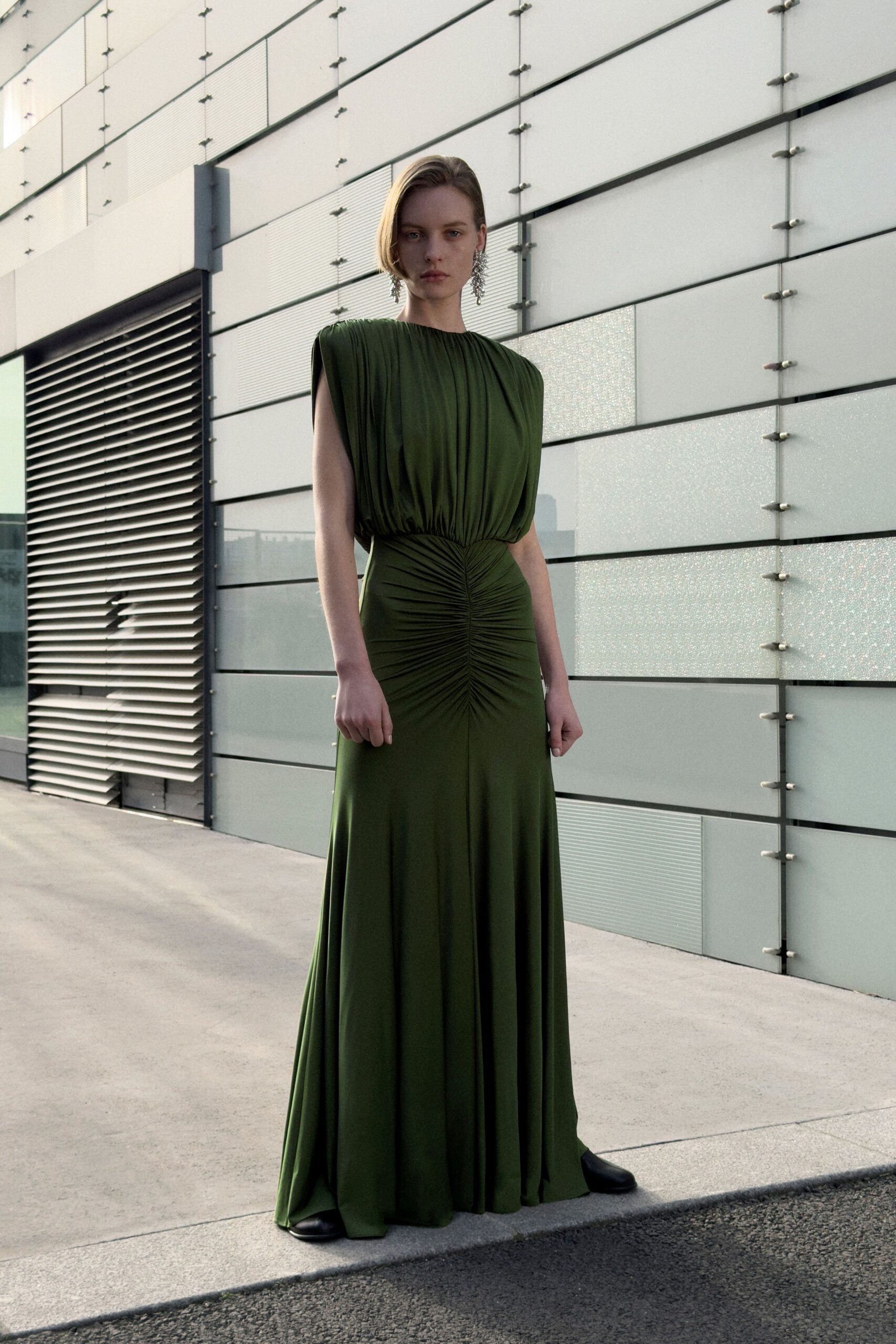 green silk sleeveless high-neck fitted ruched maxi gown