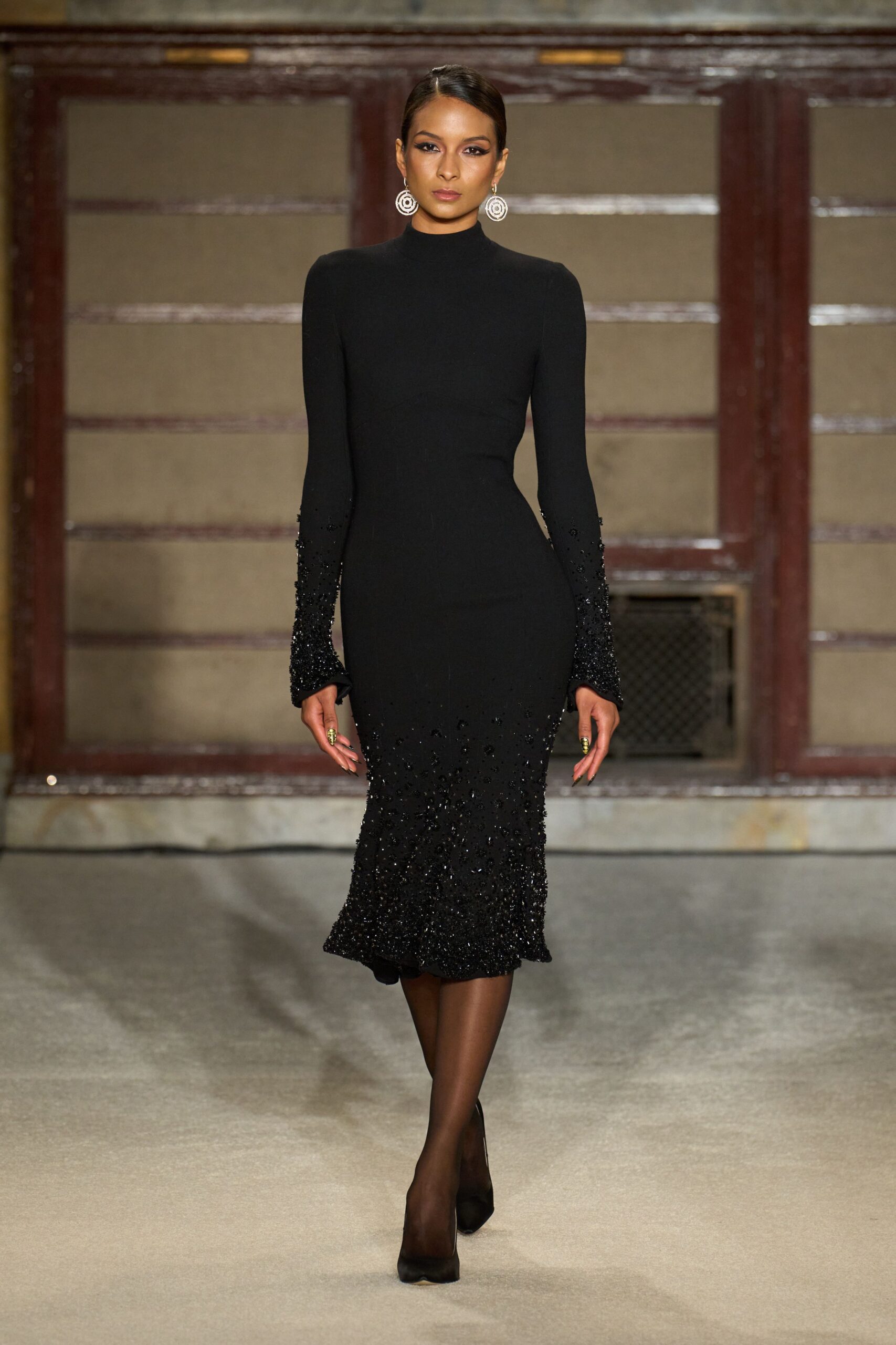 black fitted midi dress with beaded details