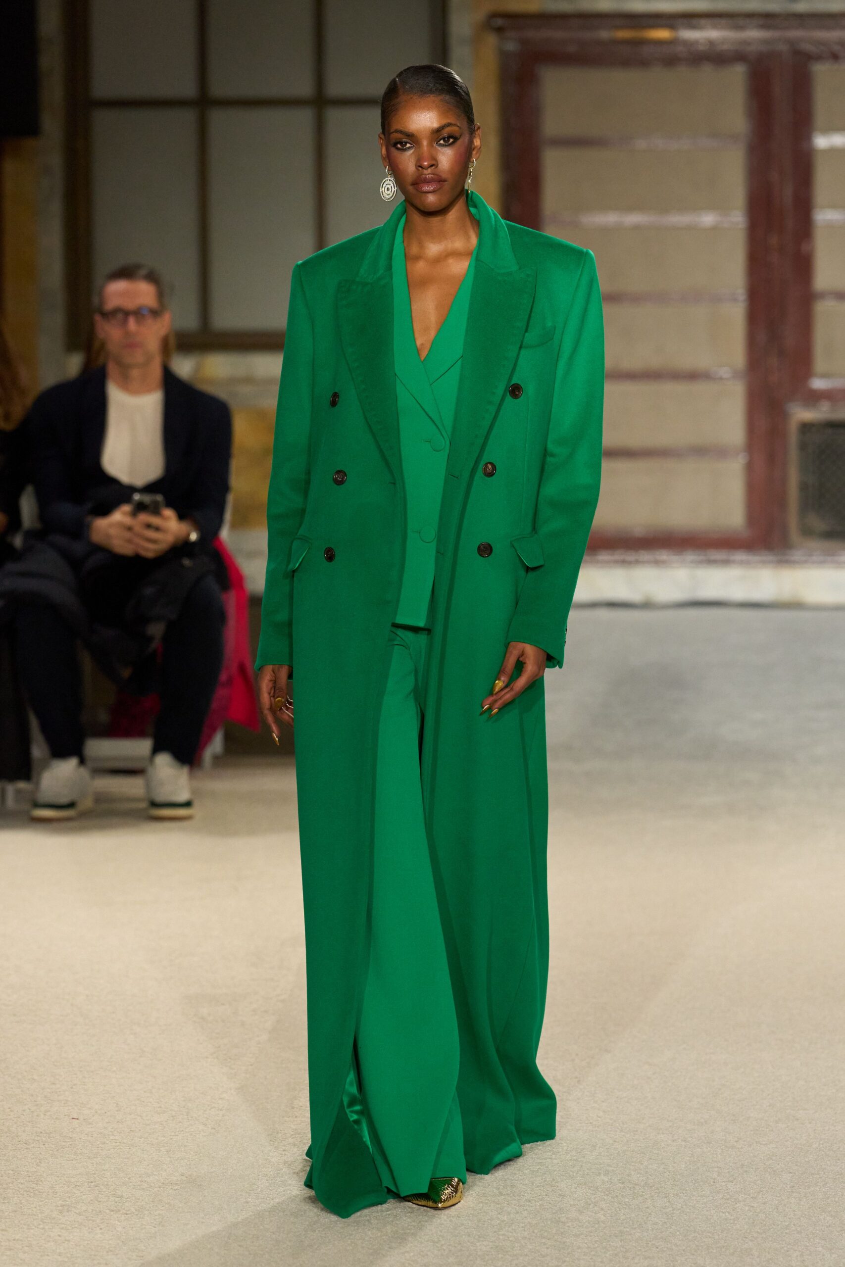 green tailored suit