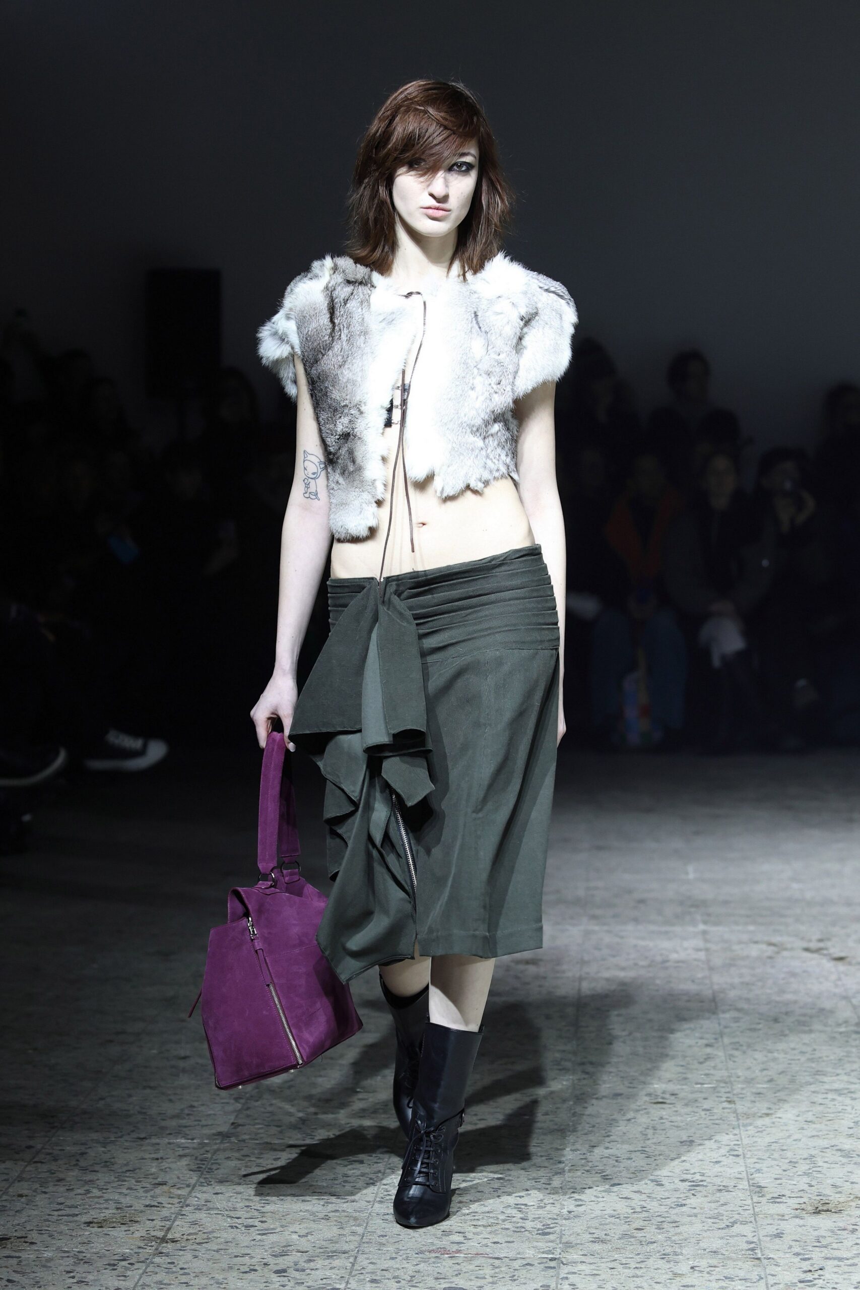 white faux-fur top with green skirt
