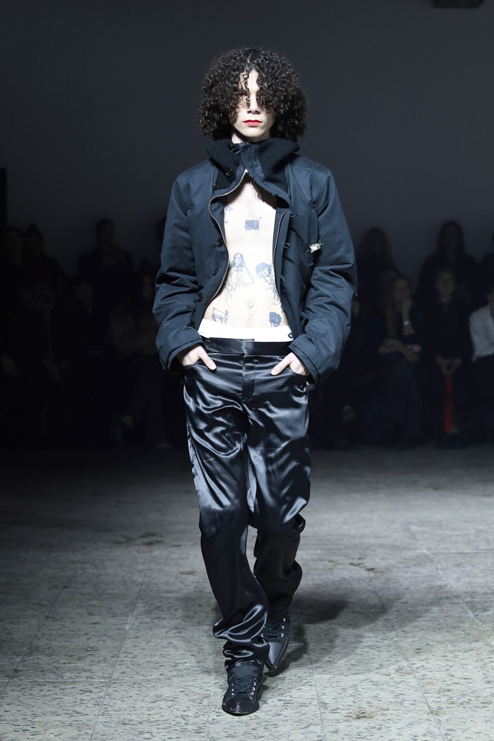 black jacket white printed top black pants