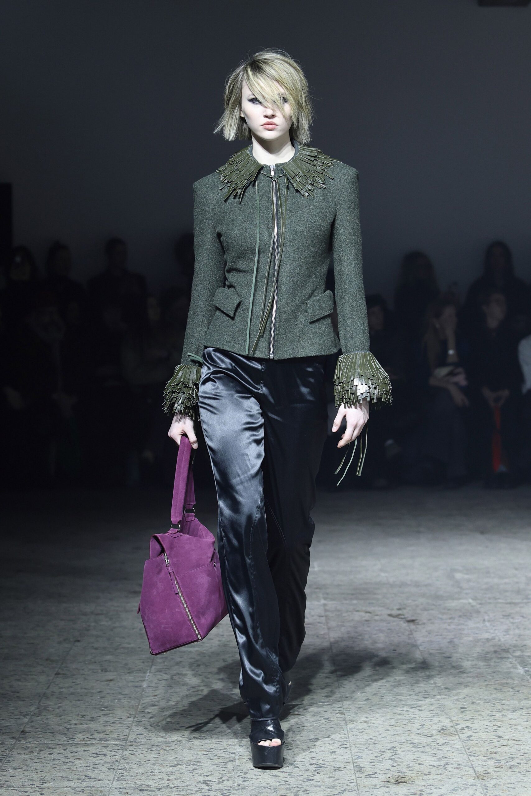green fitted jacket with fringe