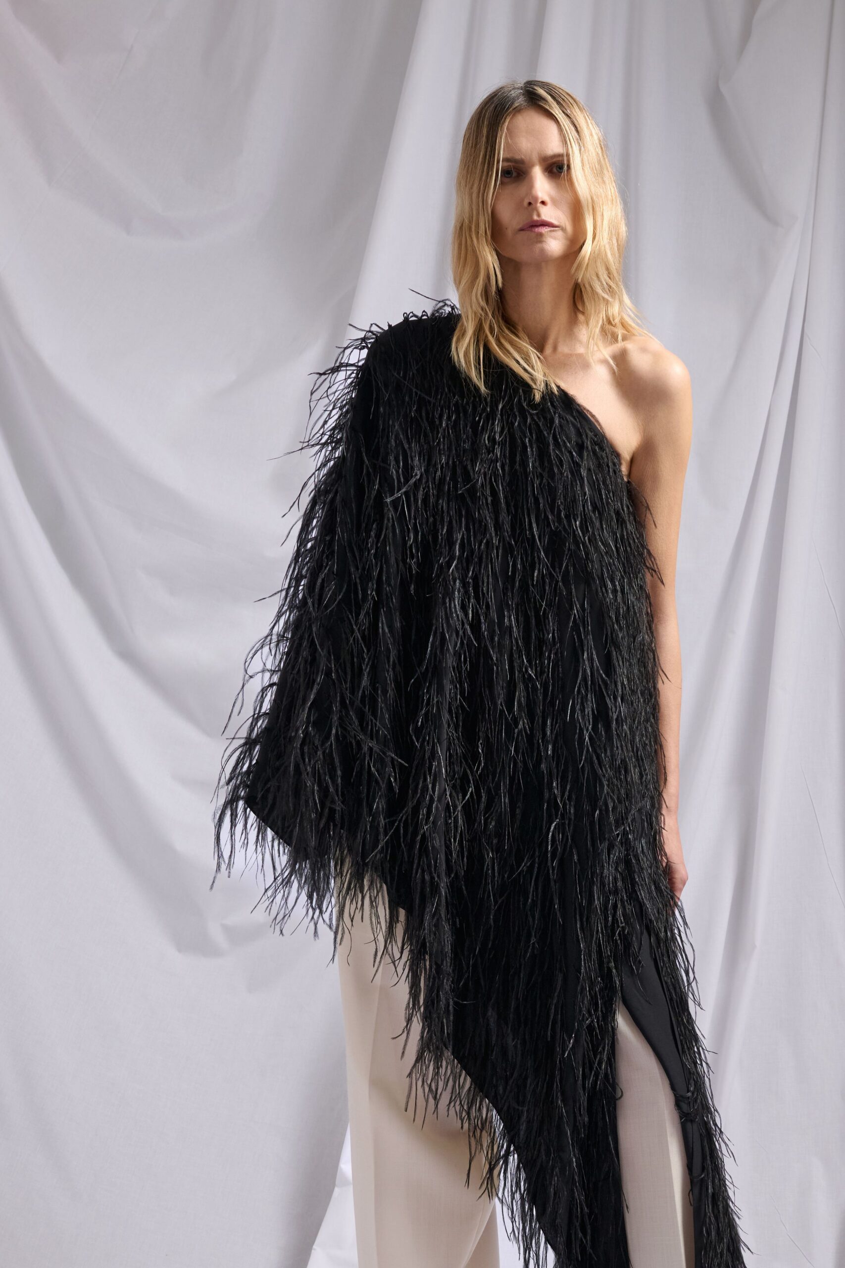 black fur sleeveless relaxed fringed top