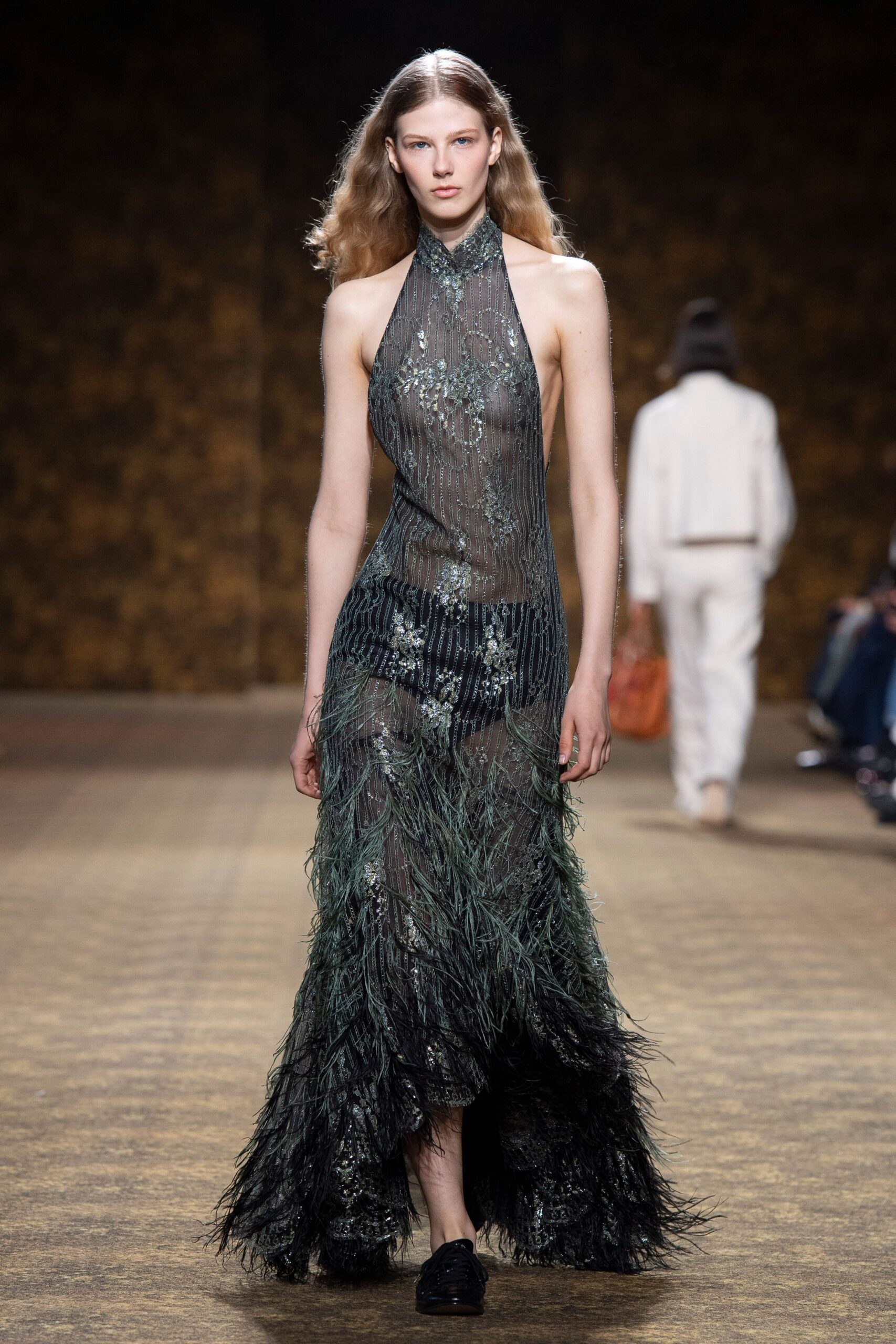 black and green feathered gown