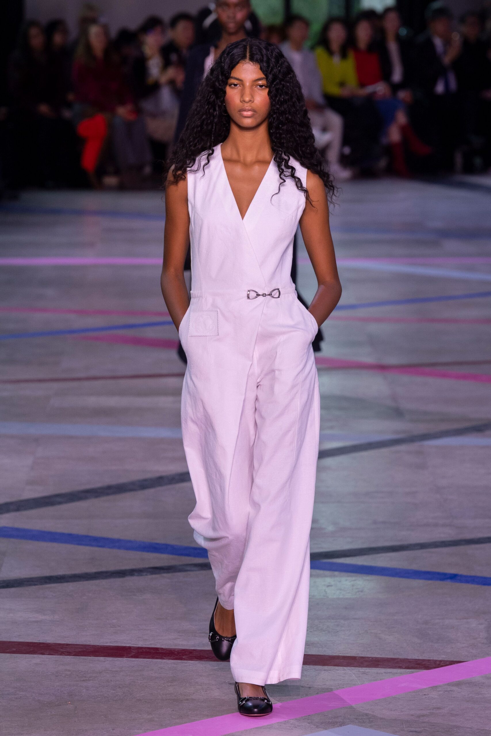 white cotton sleeveless v-neck fitted pockets jumpsuit