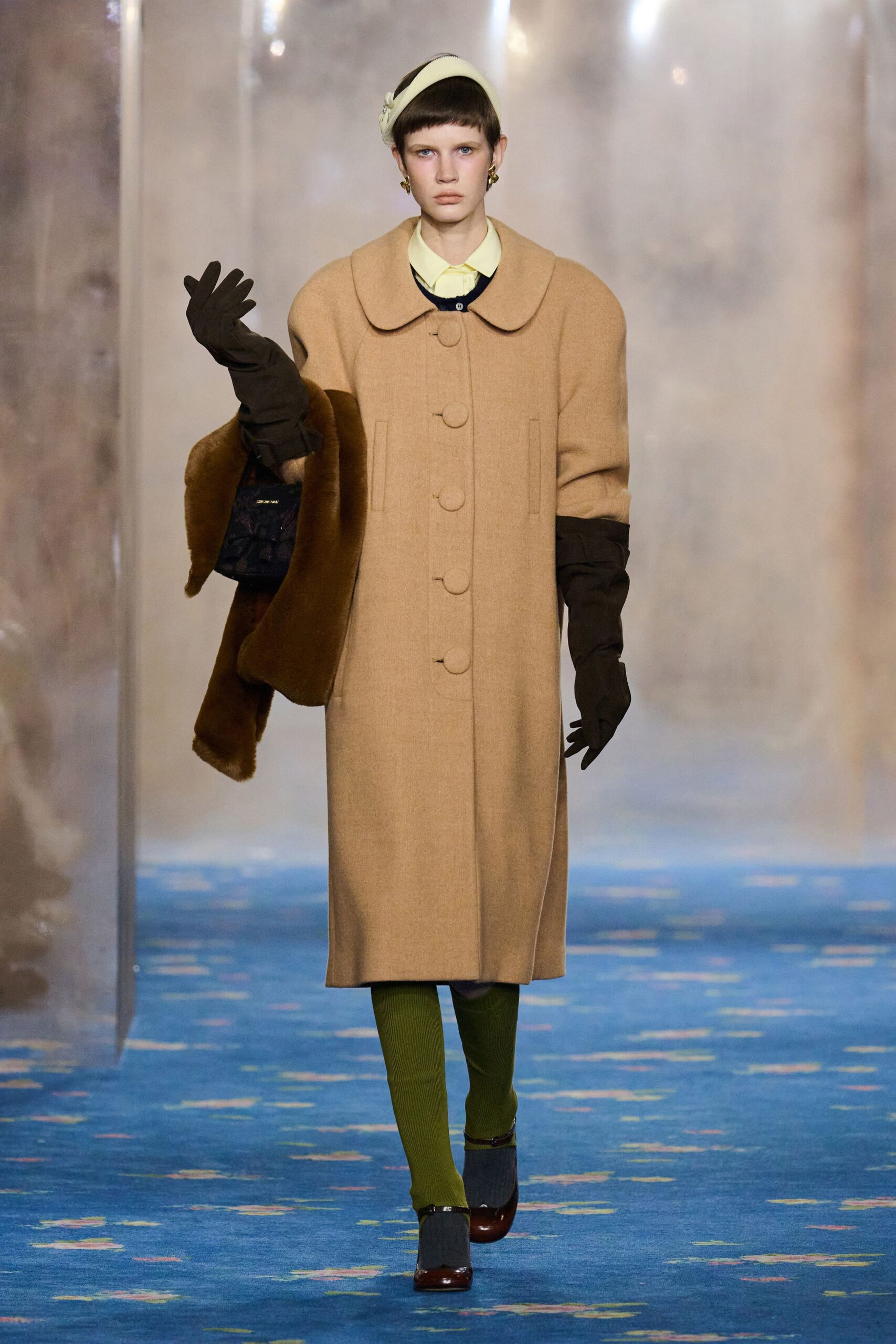 brown wool coat with yellow blouse