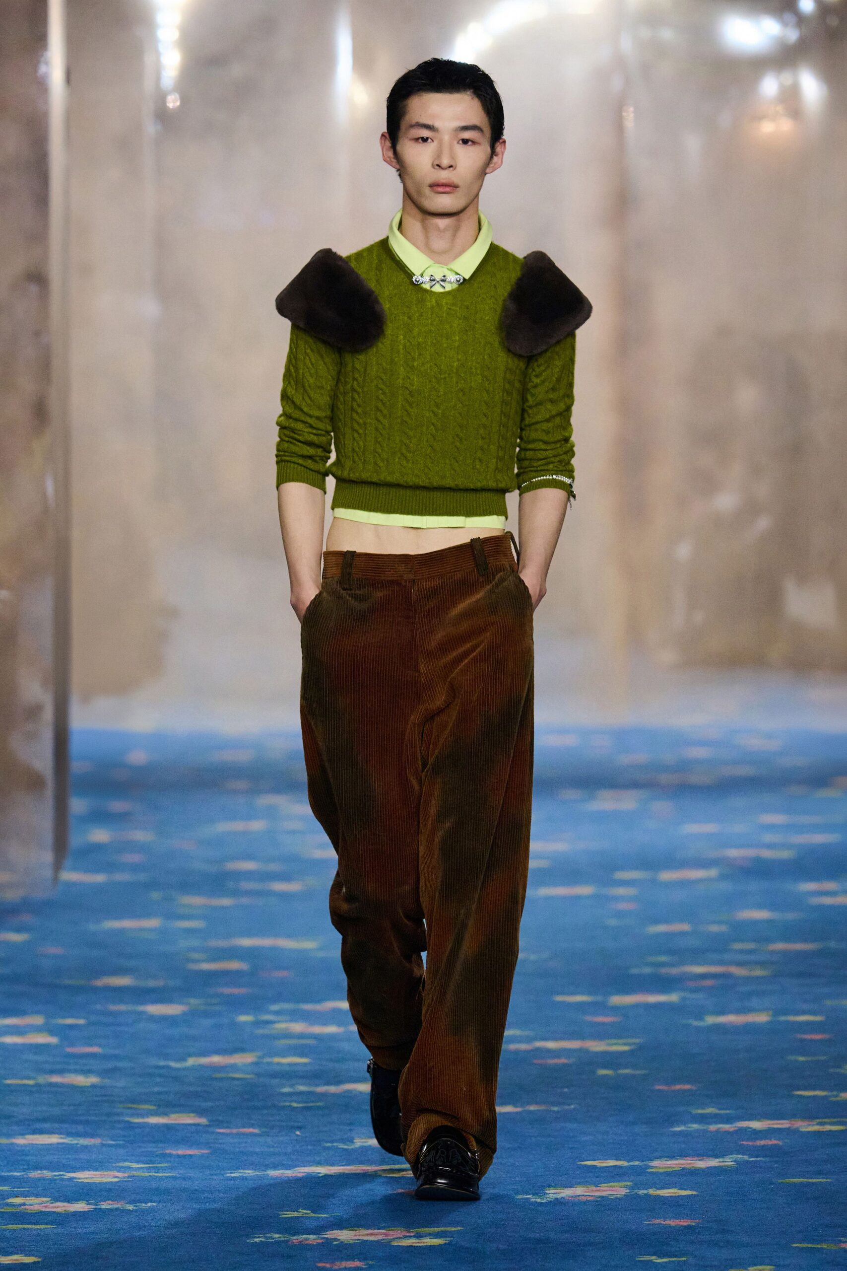 green knit sweater with brown pants