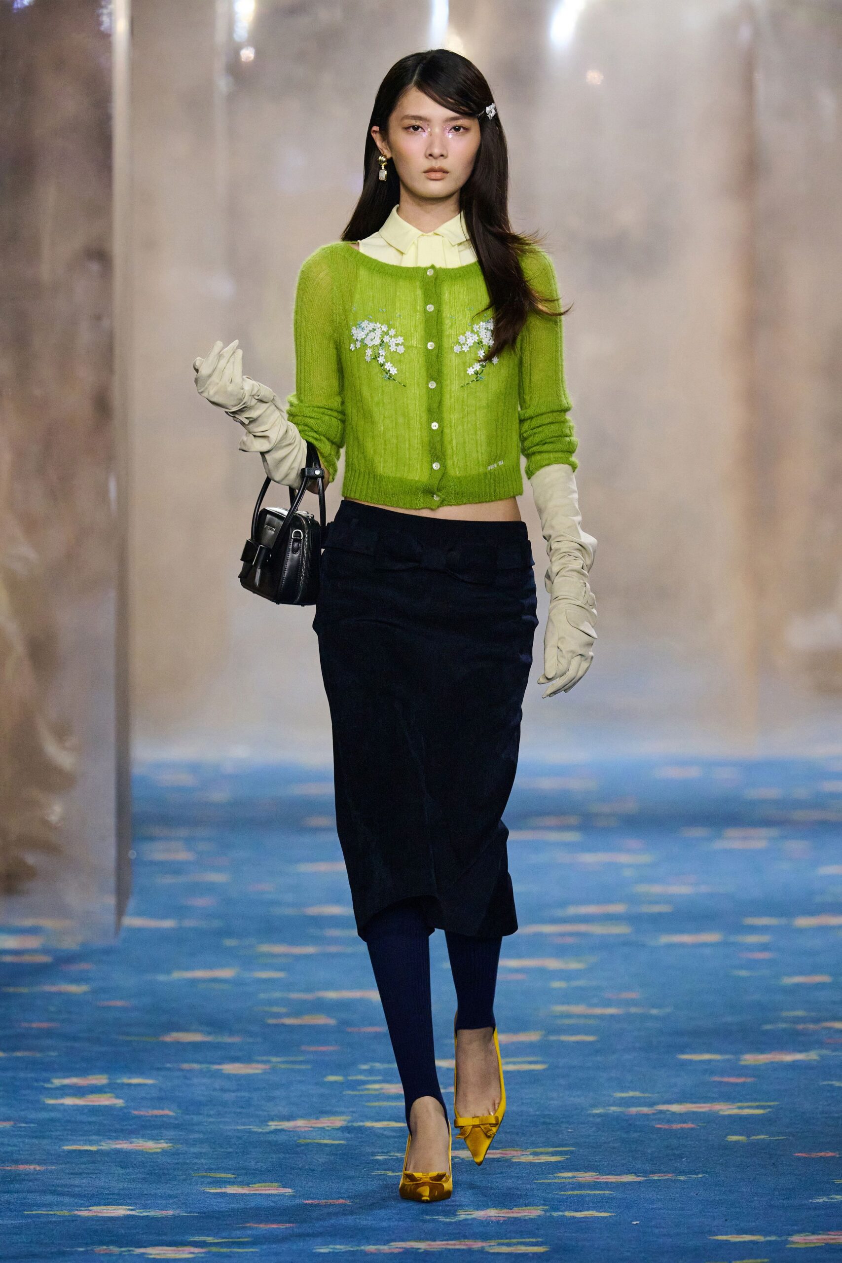 green cardigan white shirt black skirt