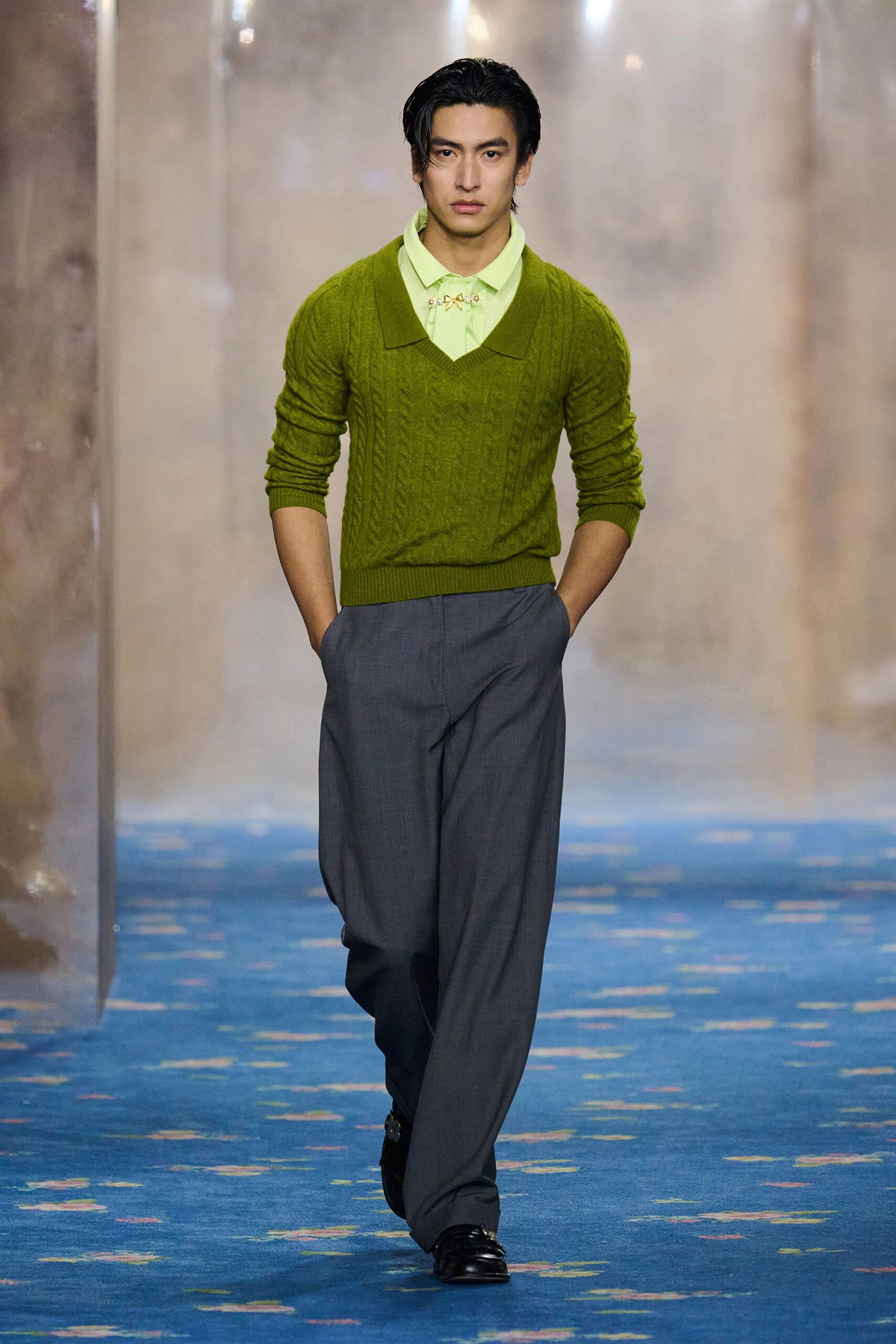 green sweater with gray pants