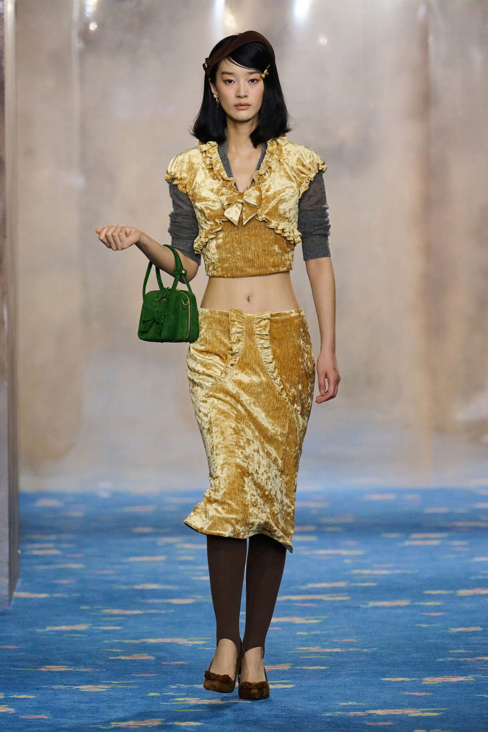 gold velvet fitted top and skirt