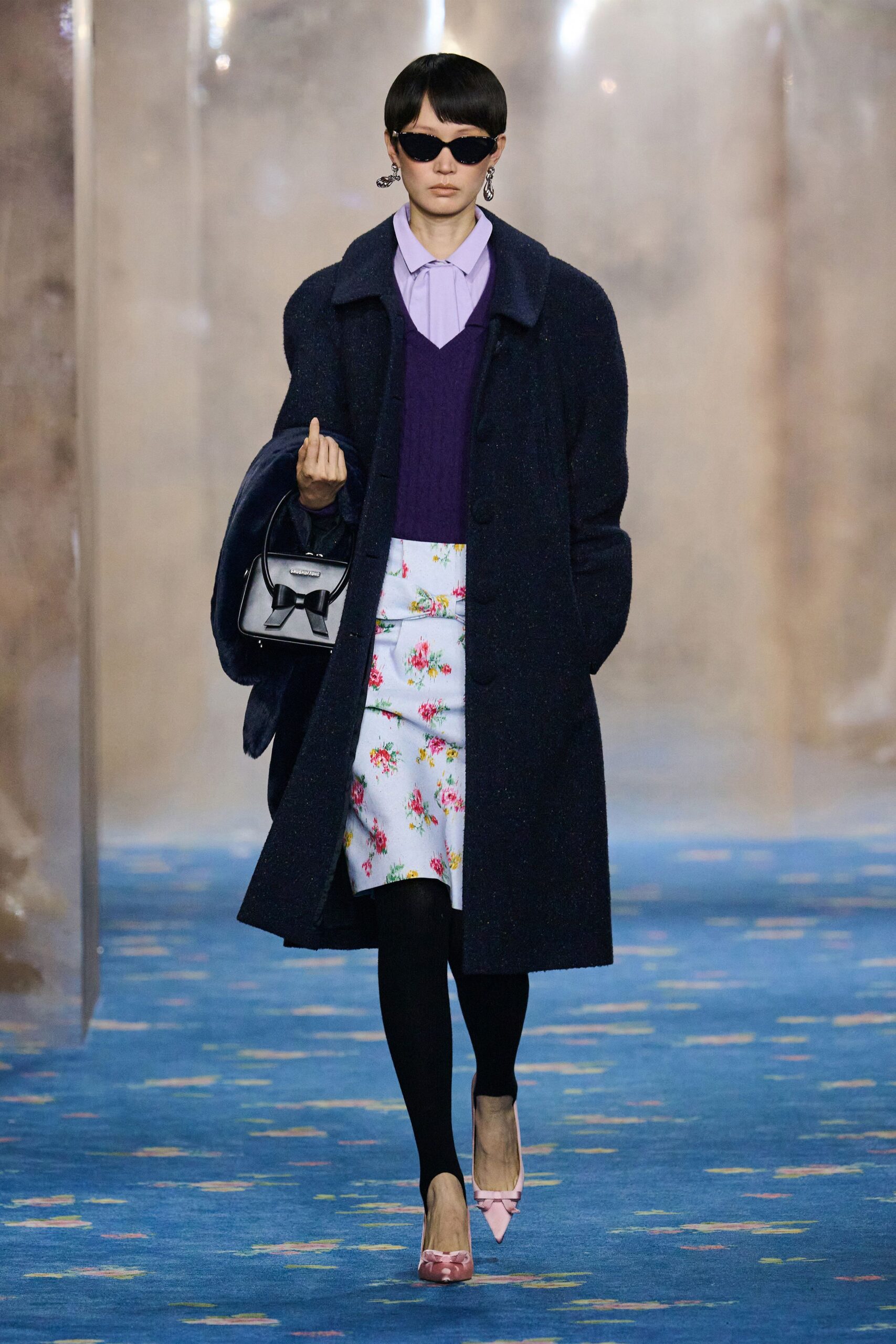 navy coat with floral skirt