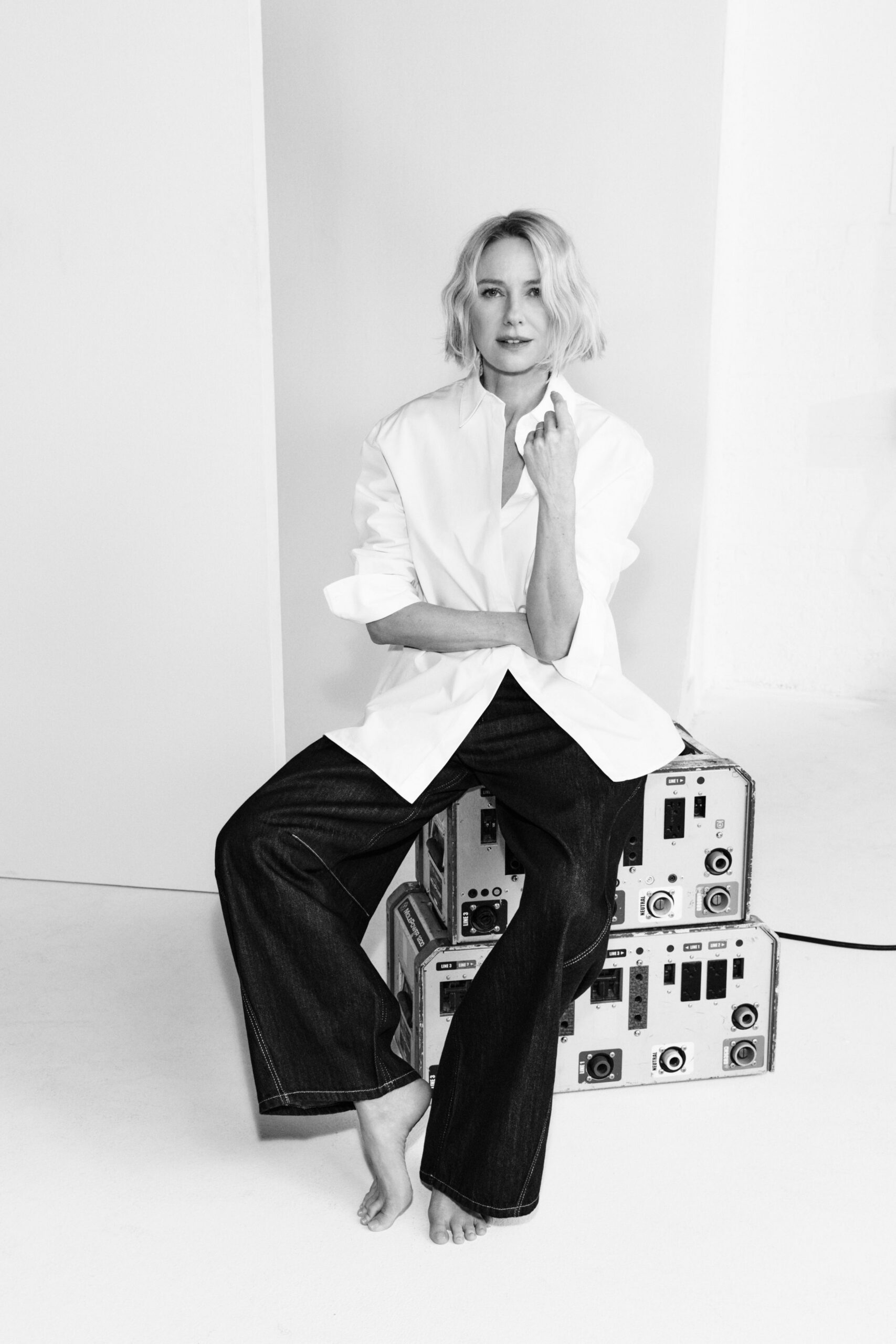 white relaxed shirt and blue wide-leg pants