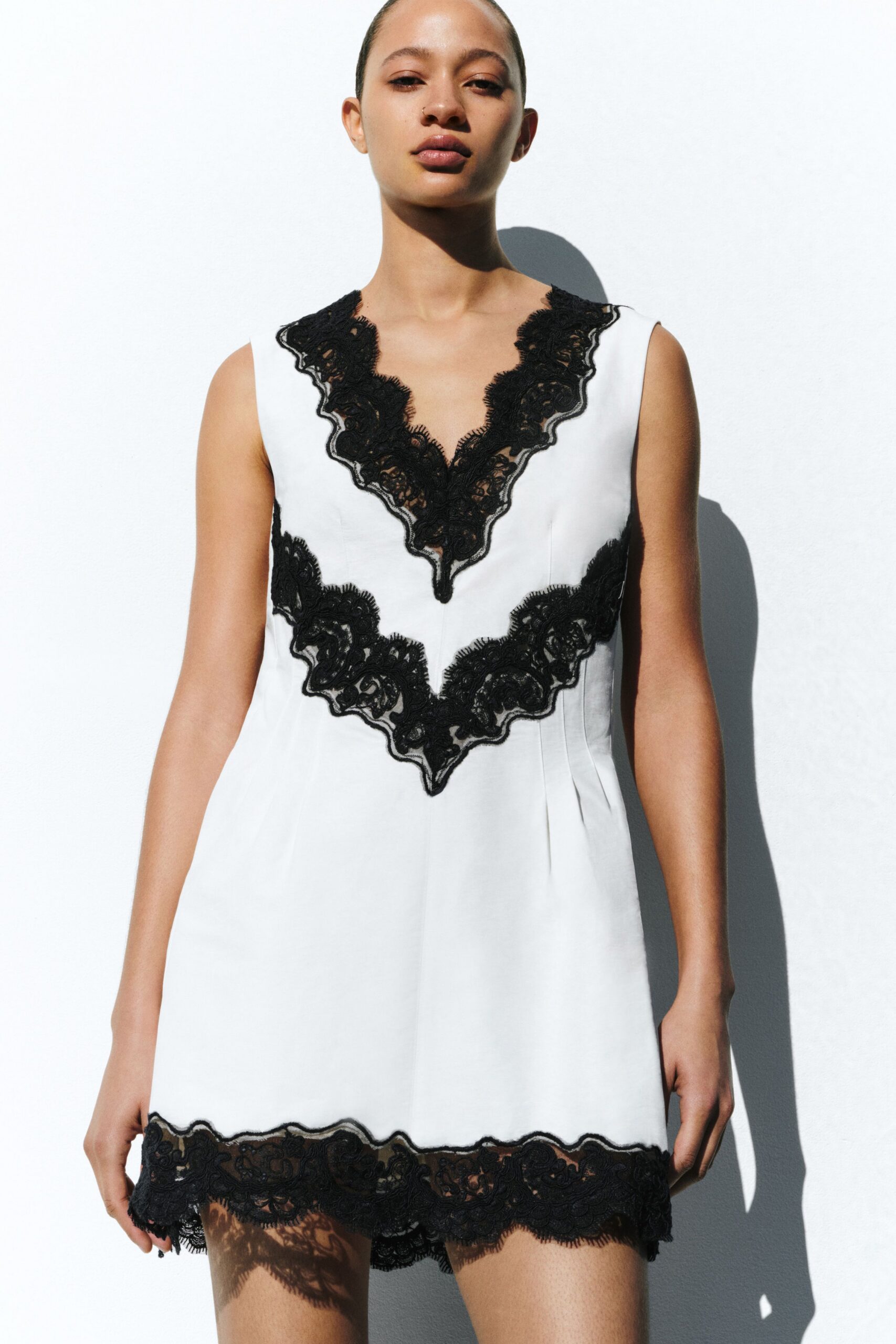 white silk sleeveless dress